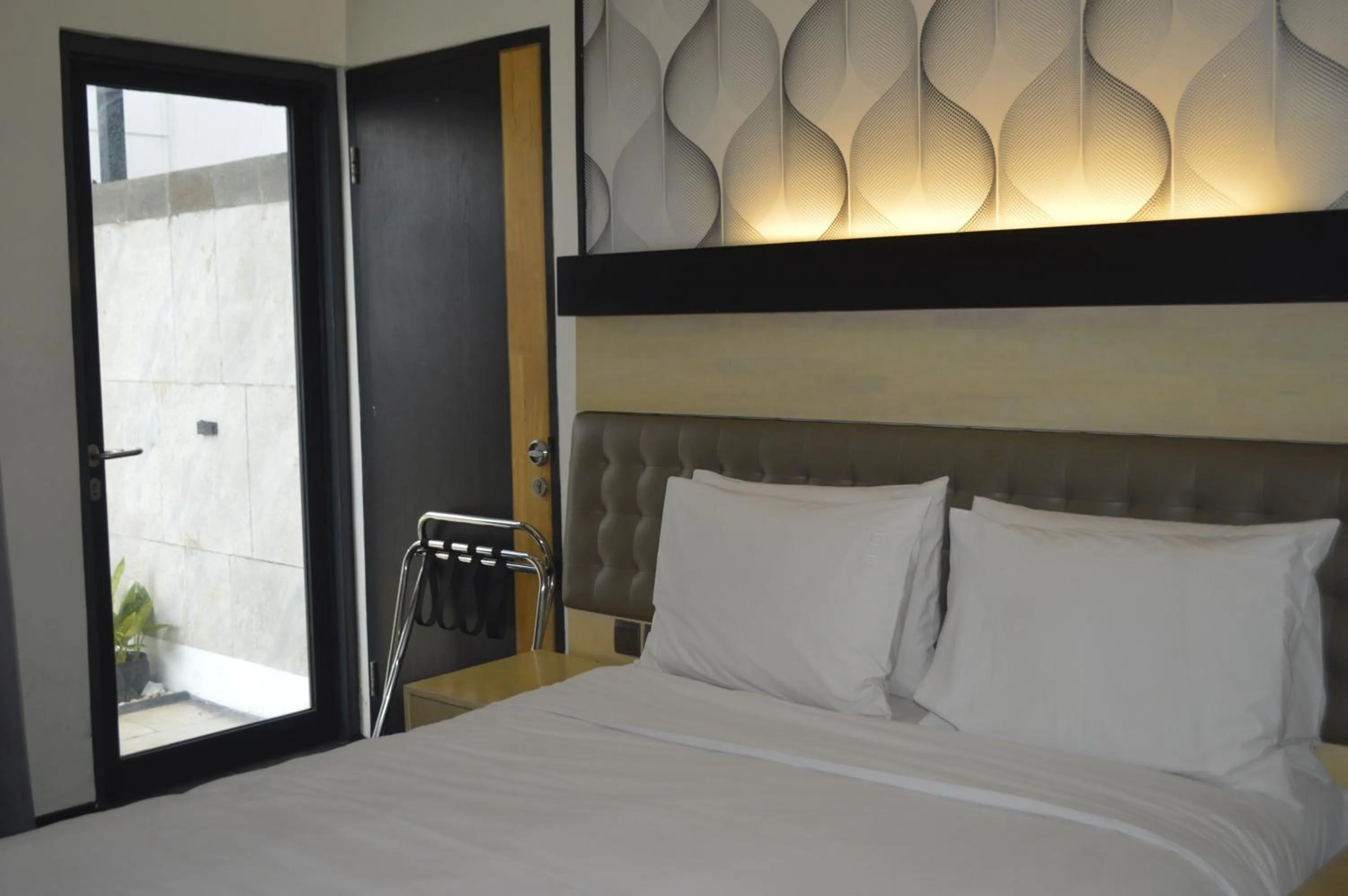 Bedroom, Bed in AI Hotel Jakarta Thamrin