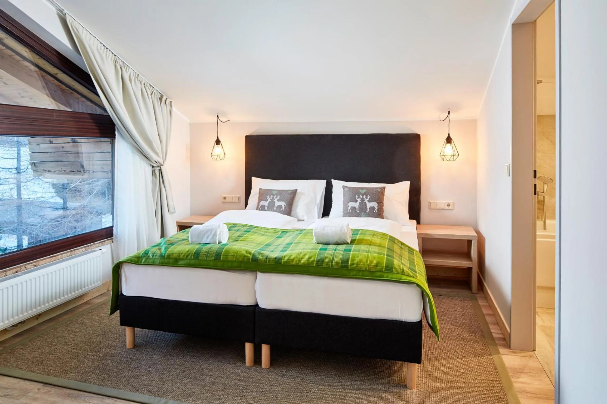 Photo of the whole room, Bed in Das Alpenhaus Katschberg 1640 inkl Lungau Card