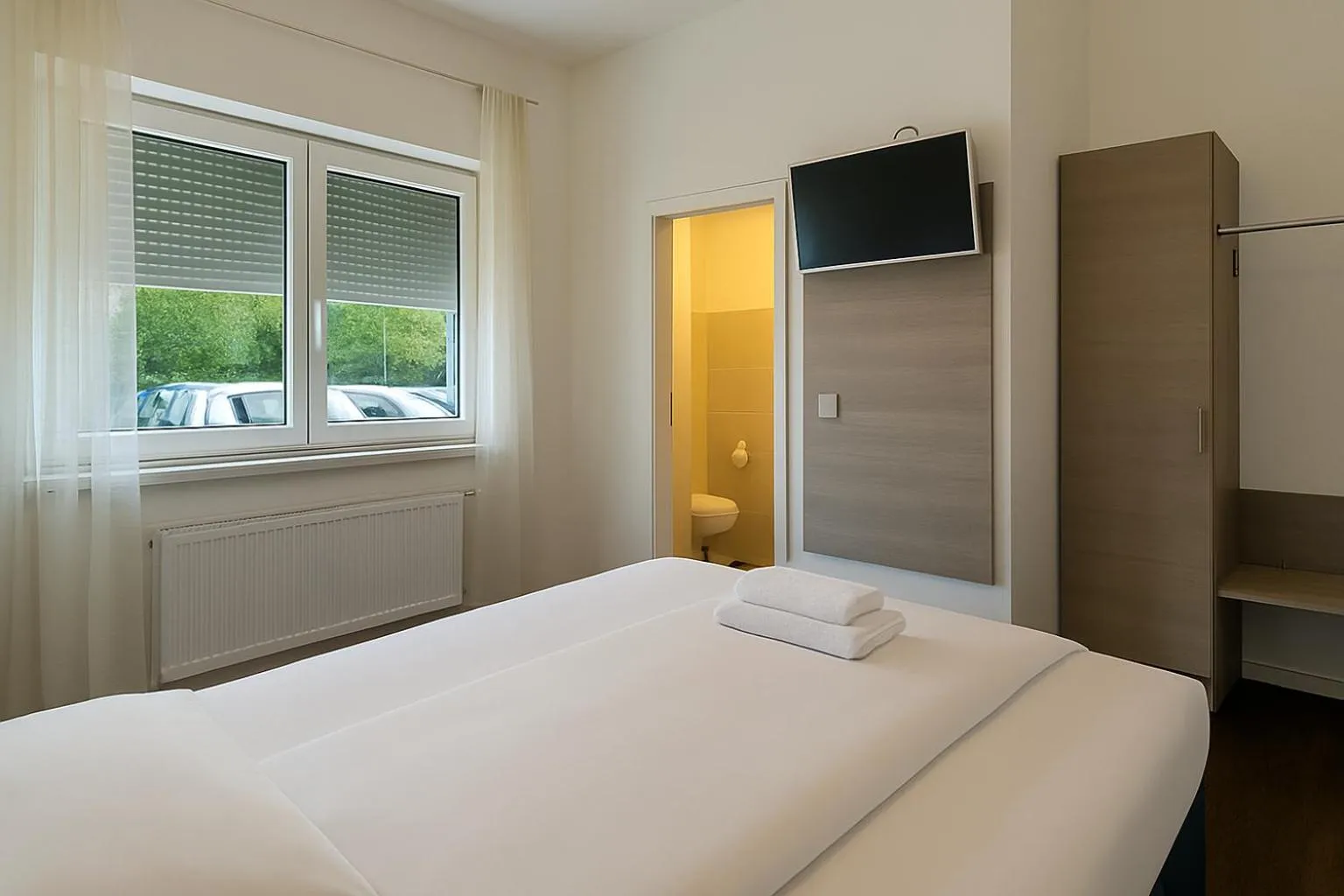 Bed in AR Boutique Hotel Heusenstamm