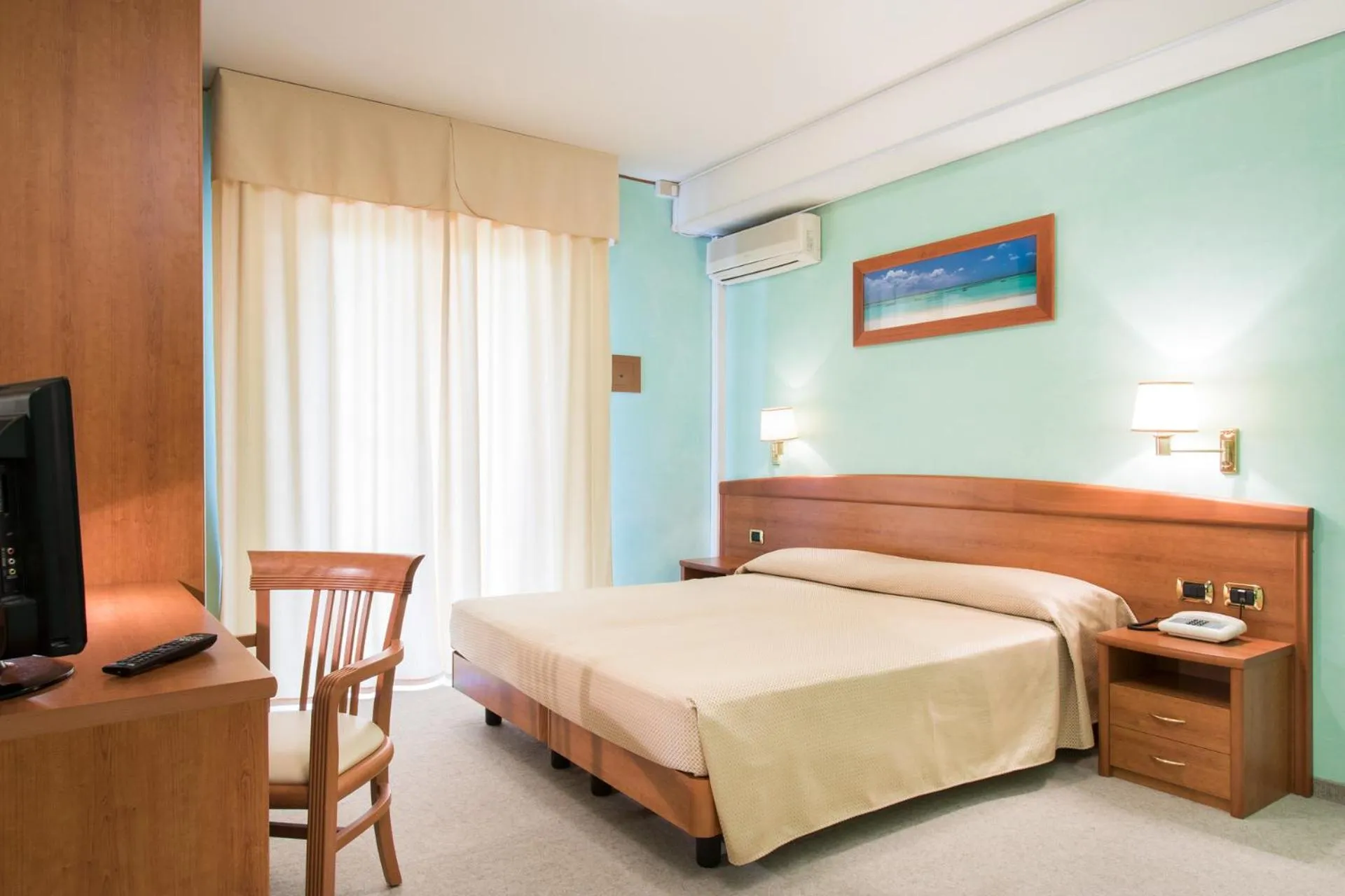 Bed in Hotel Al Cigno