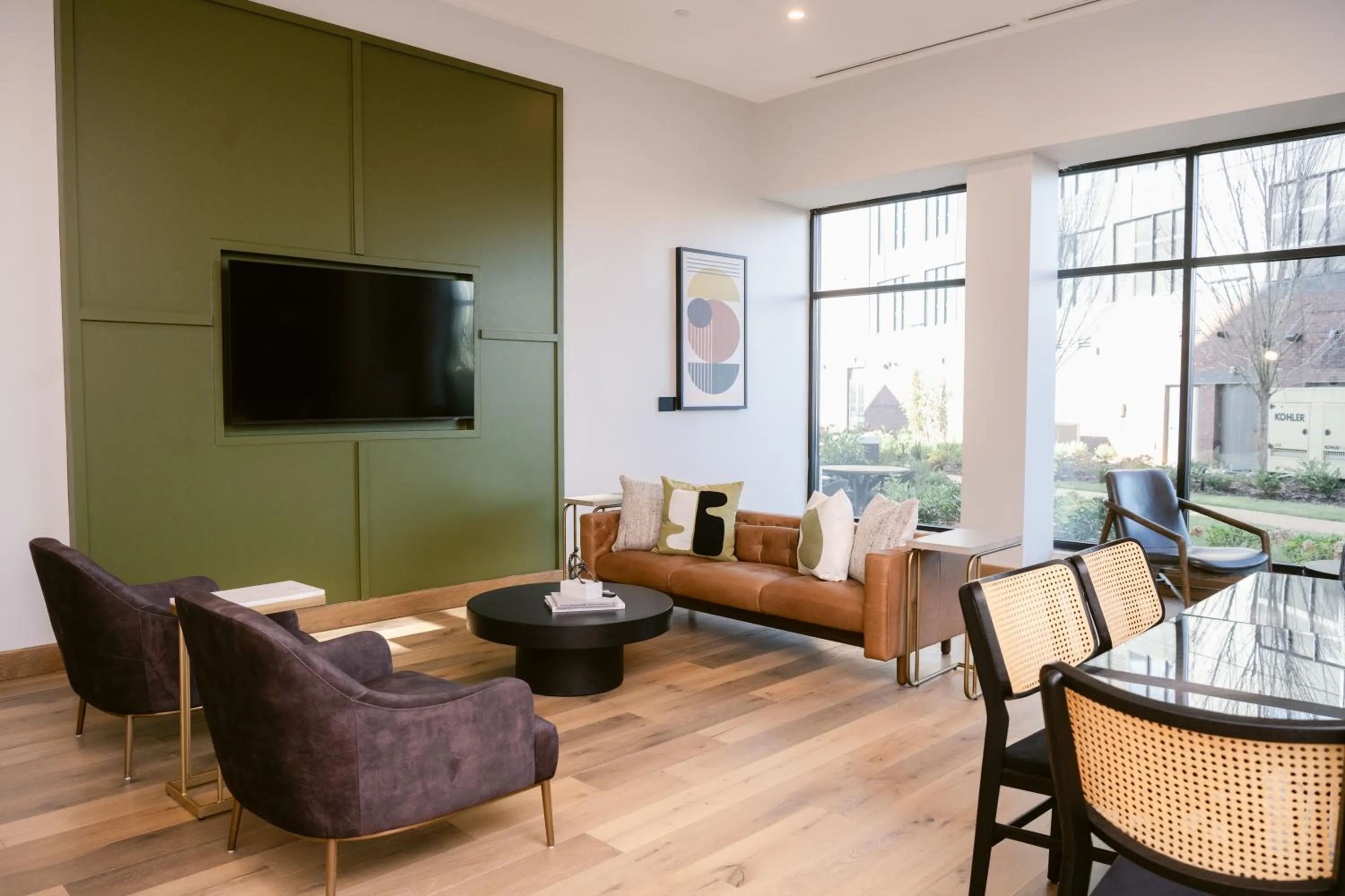 Communal lounge/ TV room in Anthem House Huntsville MidCity, powered by Placemakr