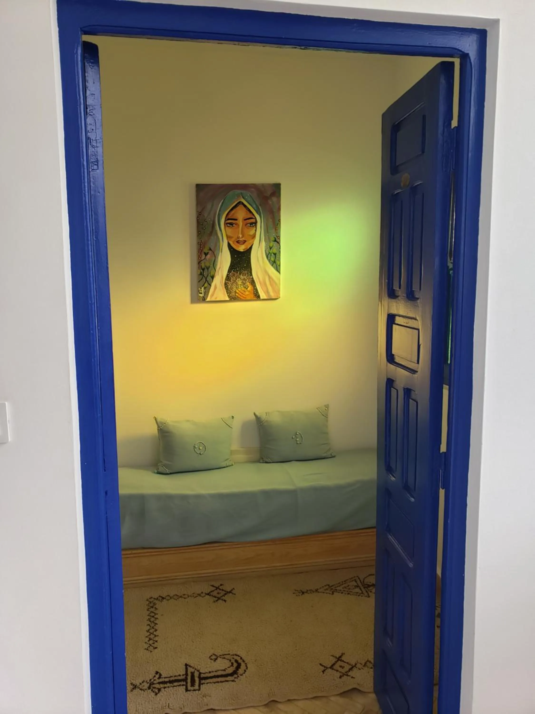 Bed in Riad Alma Mouassine