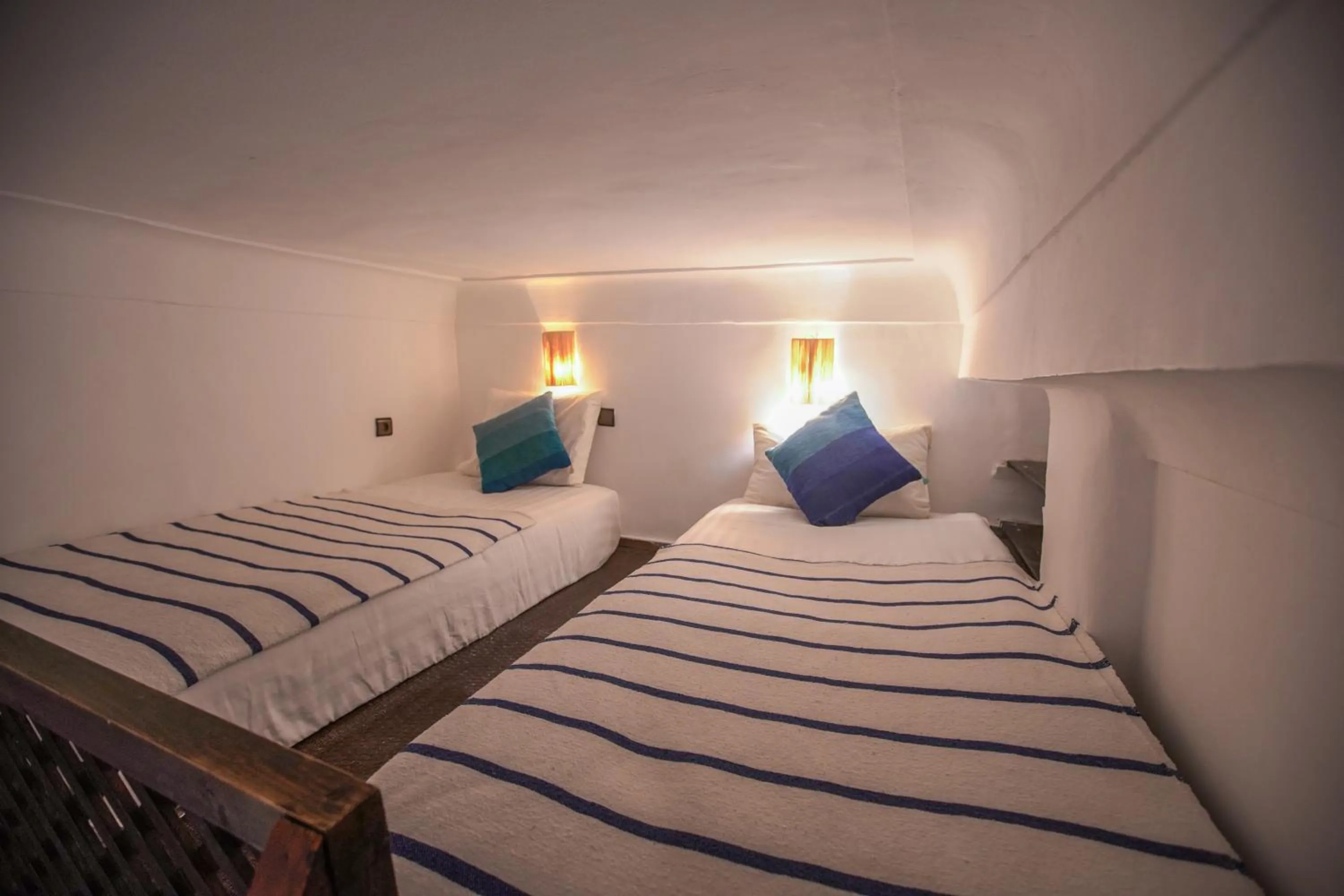 Bed in Riad Alma Mouassine