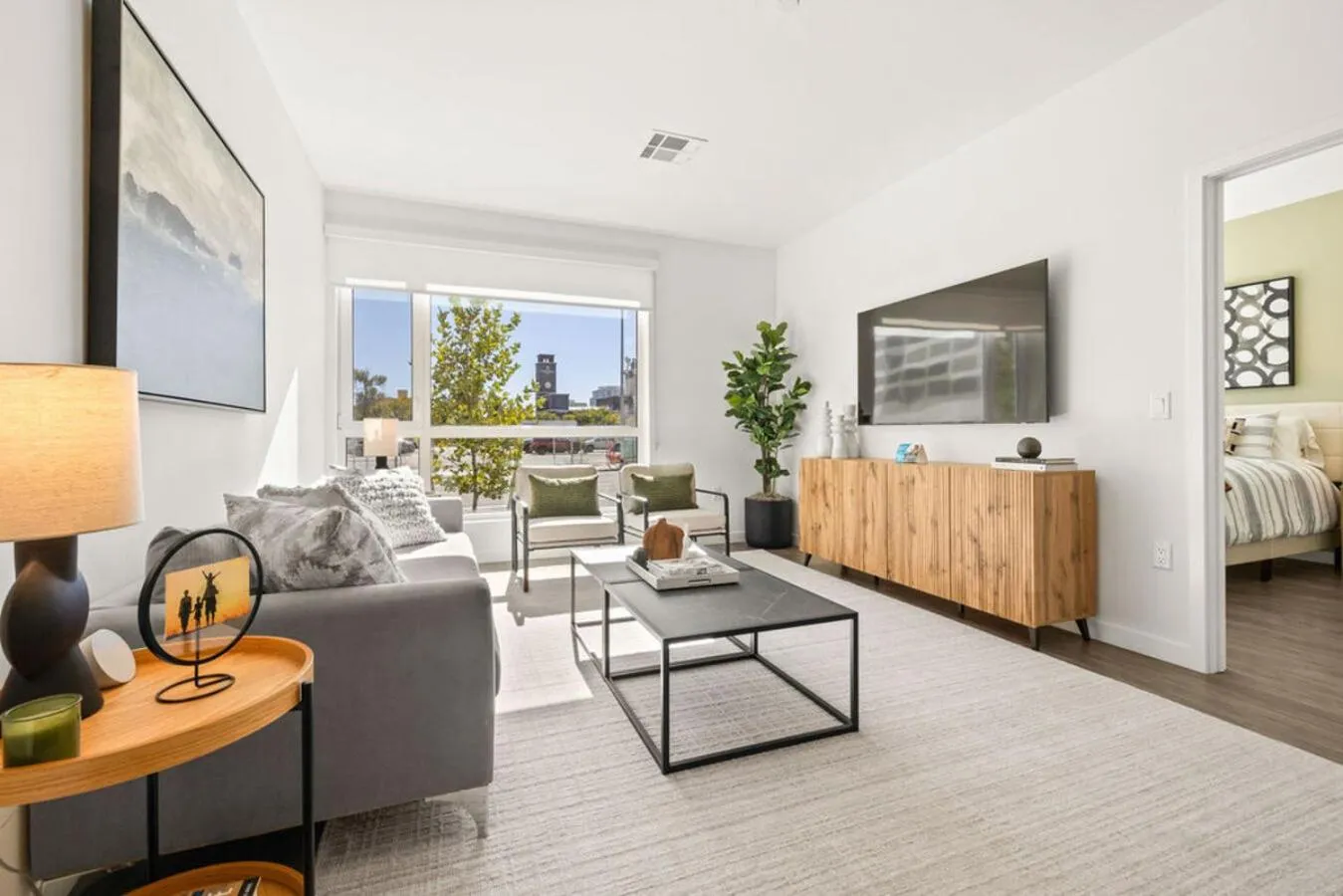 Living room, Bed in Placemakr Reno