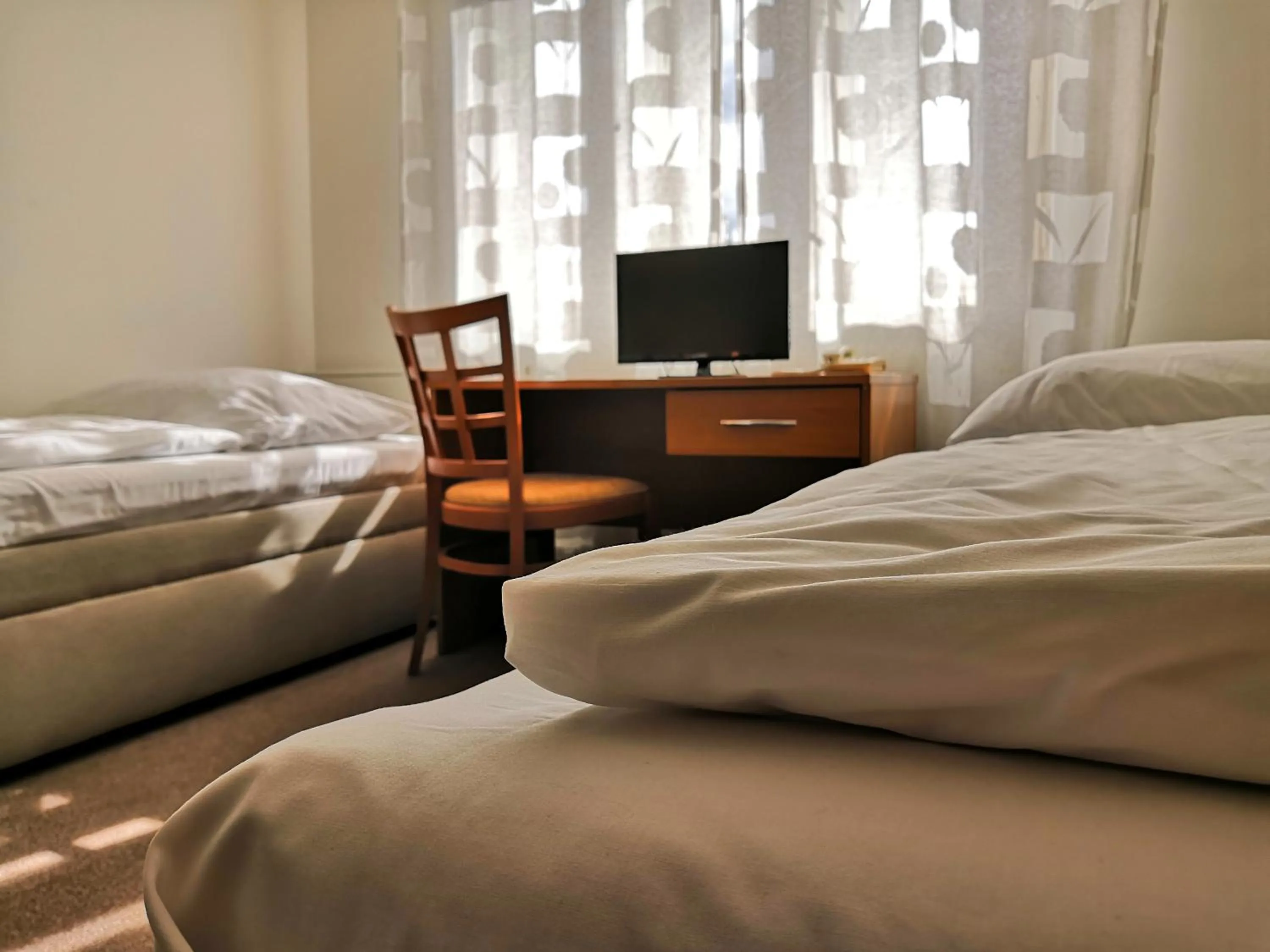 Bed in Hotel Marianeum