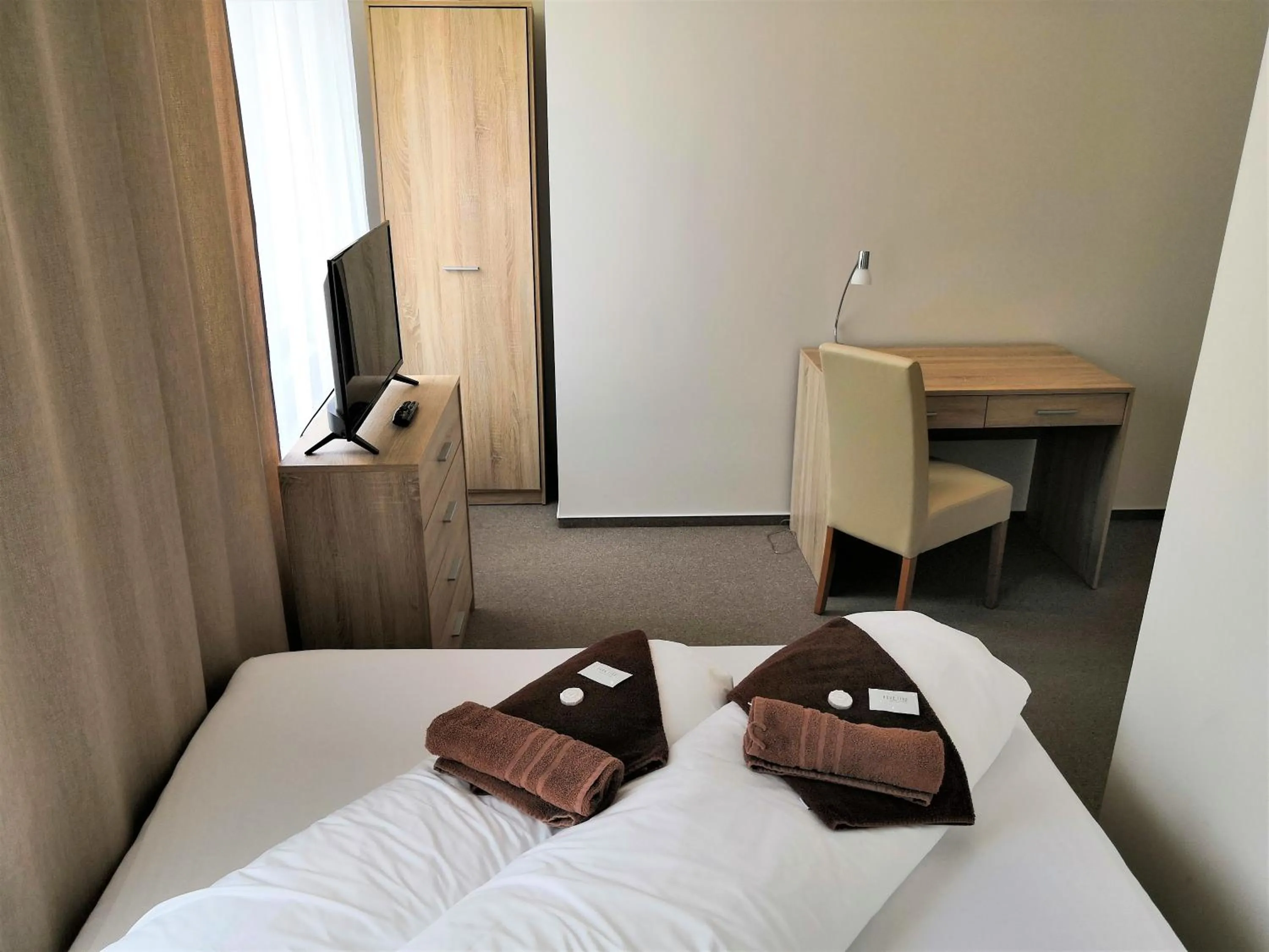 Bed in Hotel Marianeum