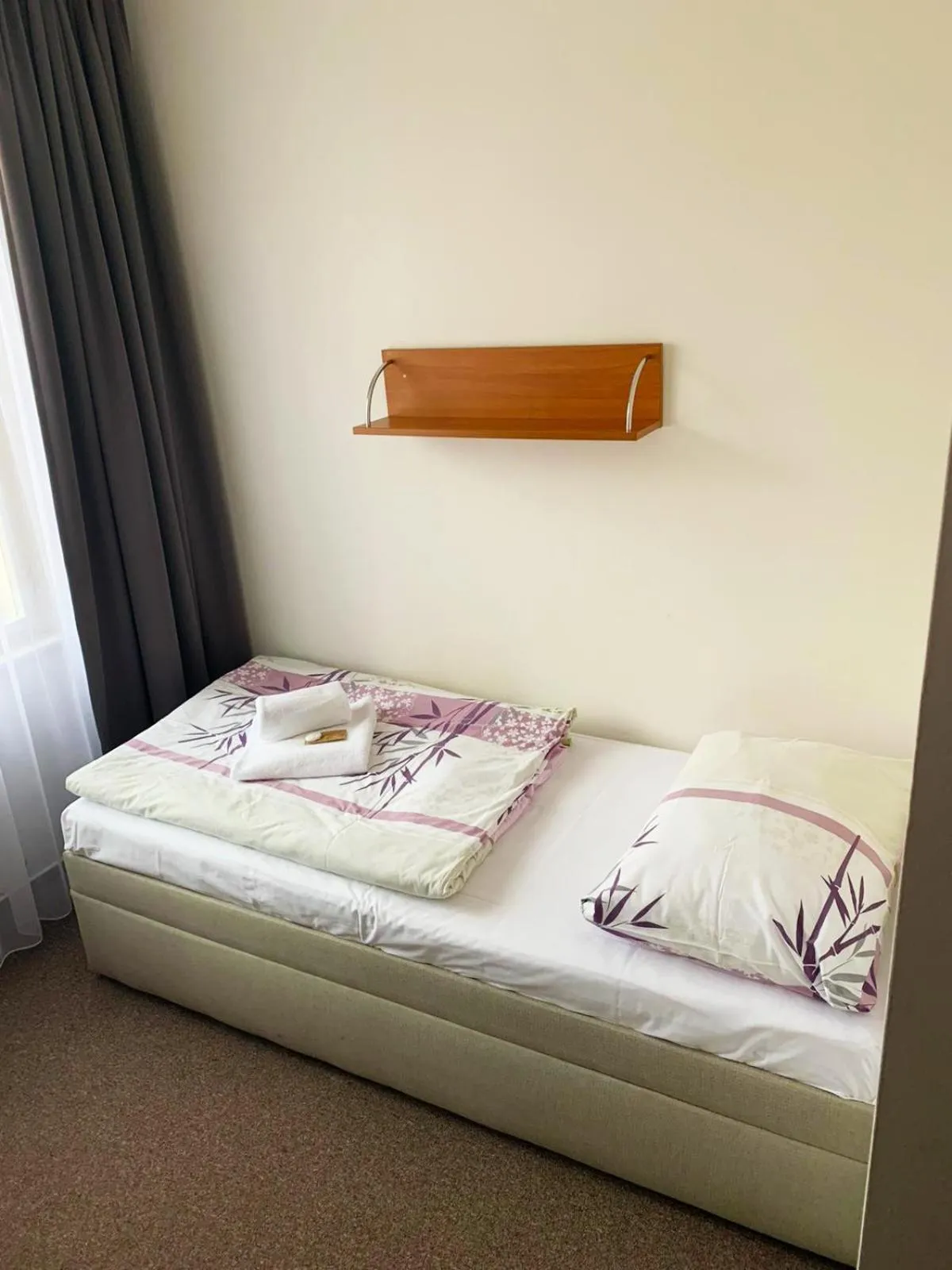 Bed in Hotel Marianeum