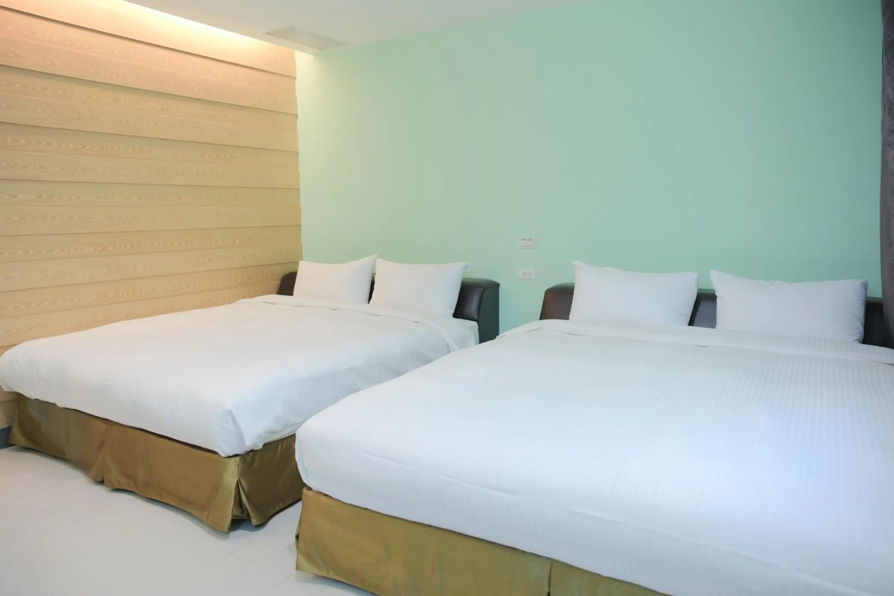 Bed in 823 Tourist Hotel