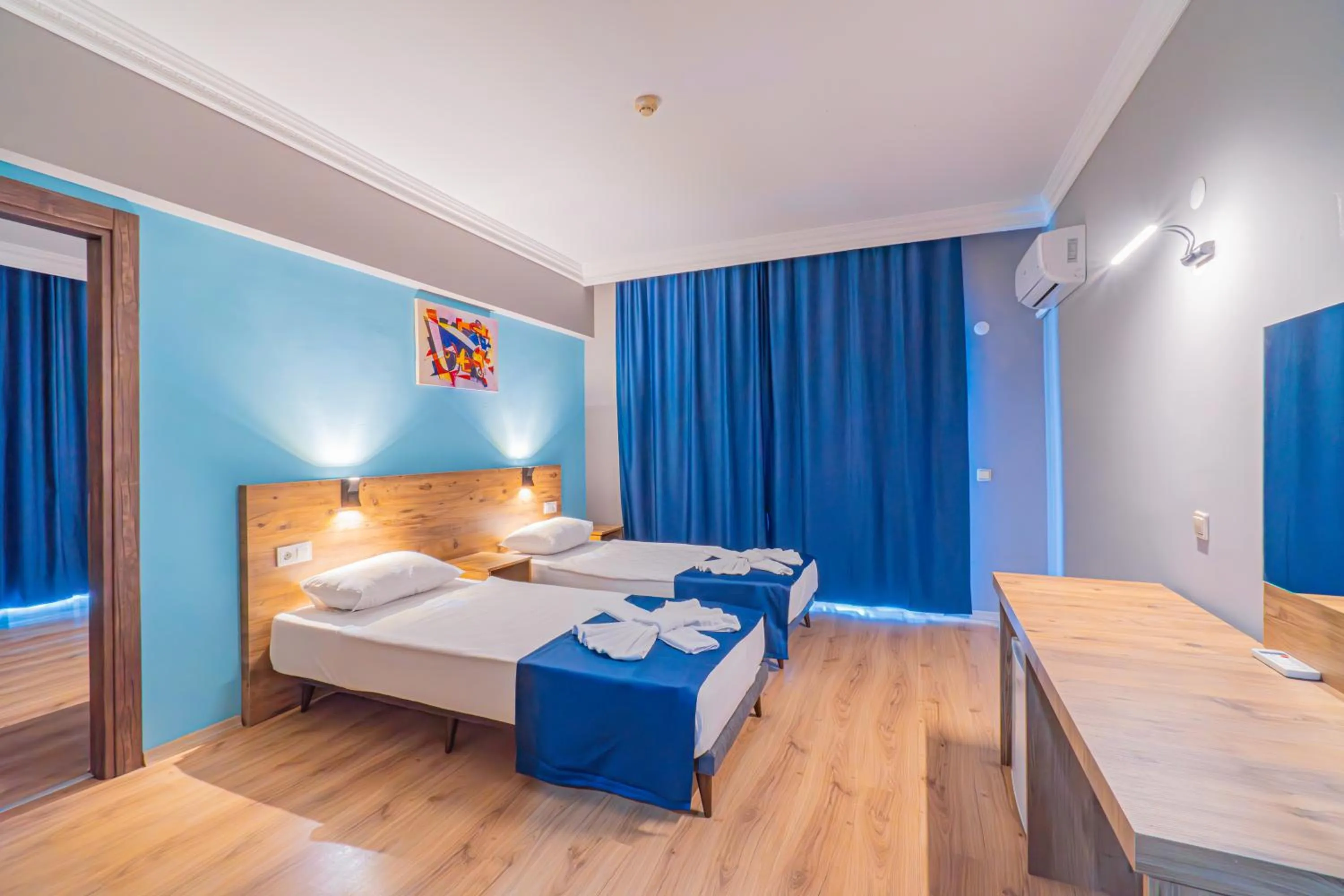 Bed in Pyxis Point Hotel - All Inclusive