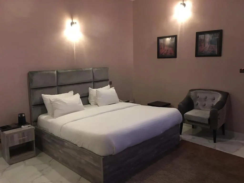 Bed in La VOD Hotel