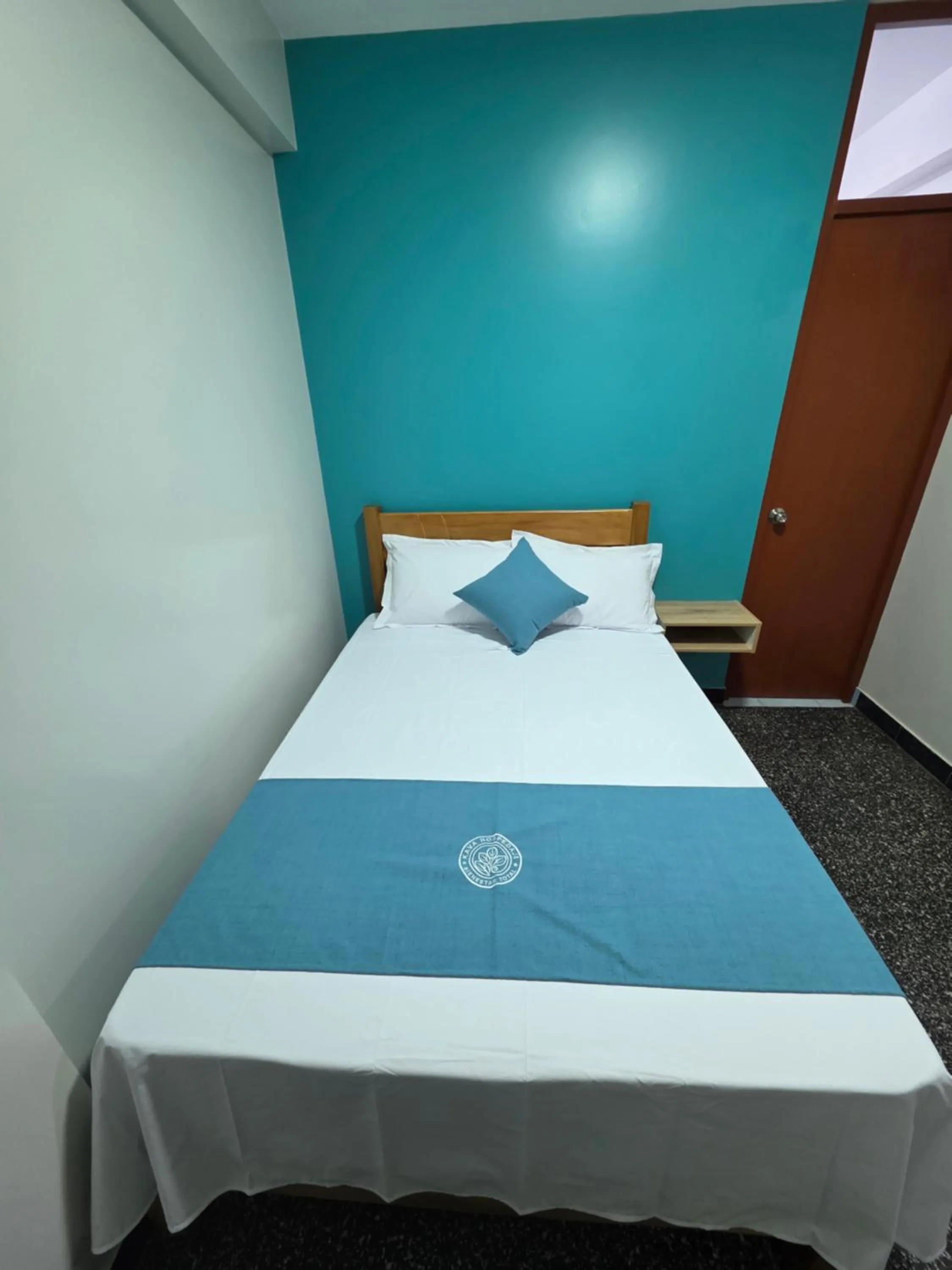 Bed in Hospedaje Kava