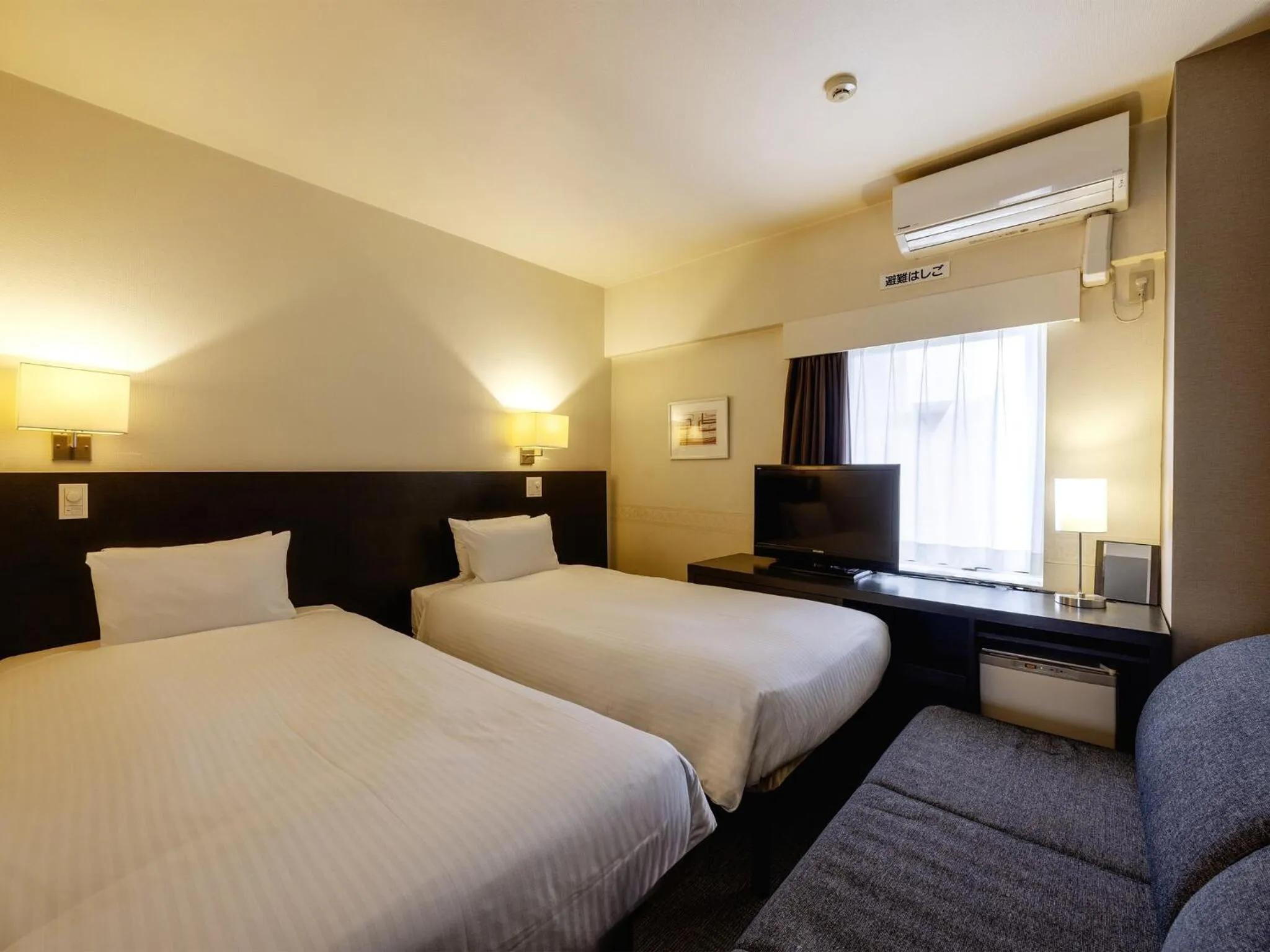 Photo of the whole room, Bed in KOKO HOTEL Yokohama Tsurumi
