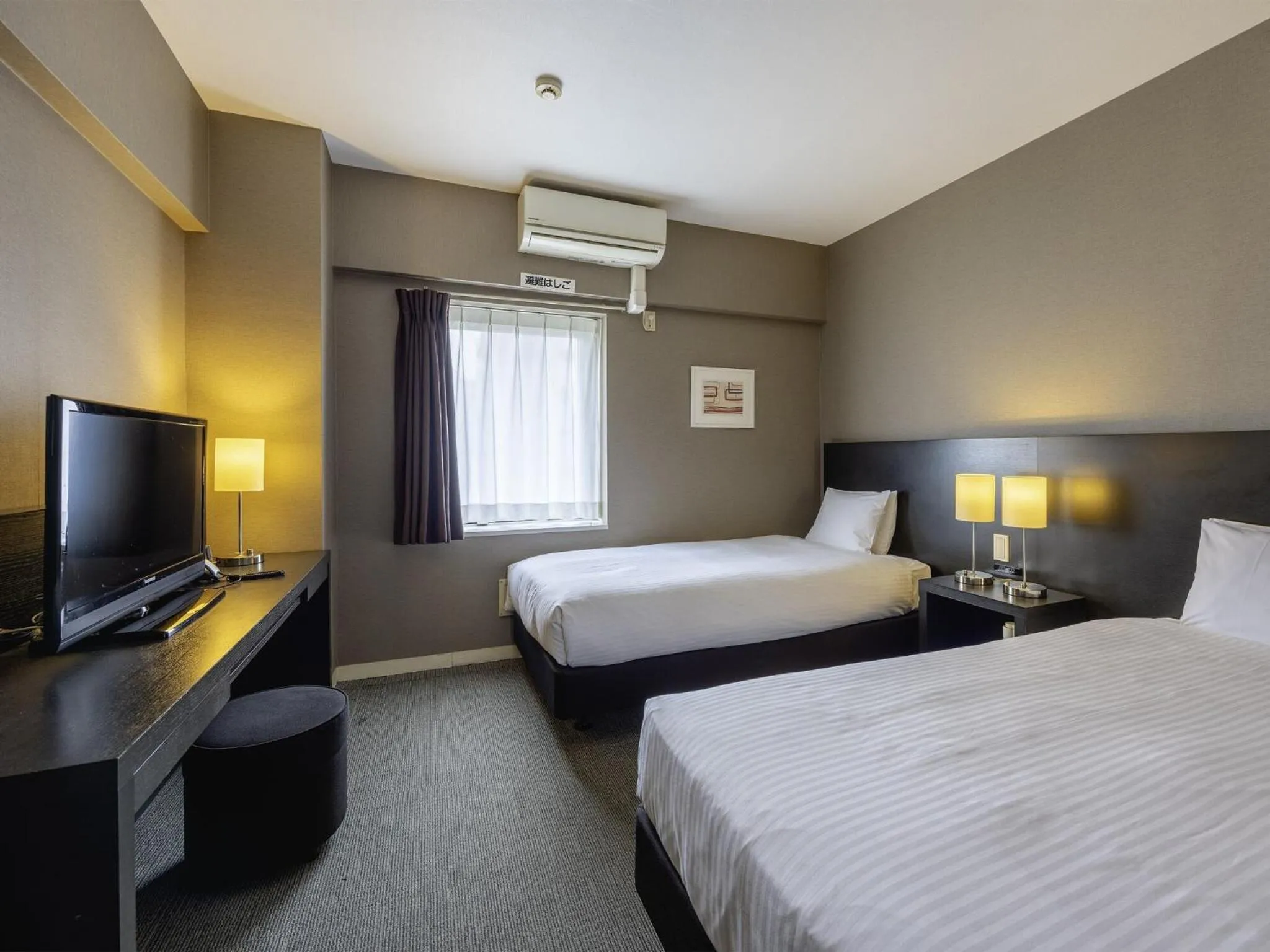 Photo of the whole room, Bed in KOKO HOTEL Yokohama Tsurumi