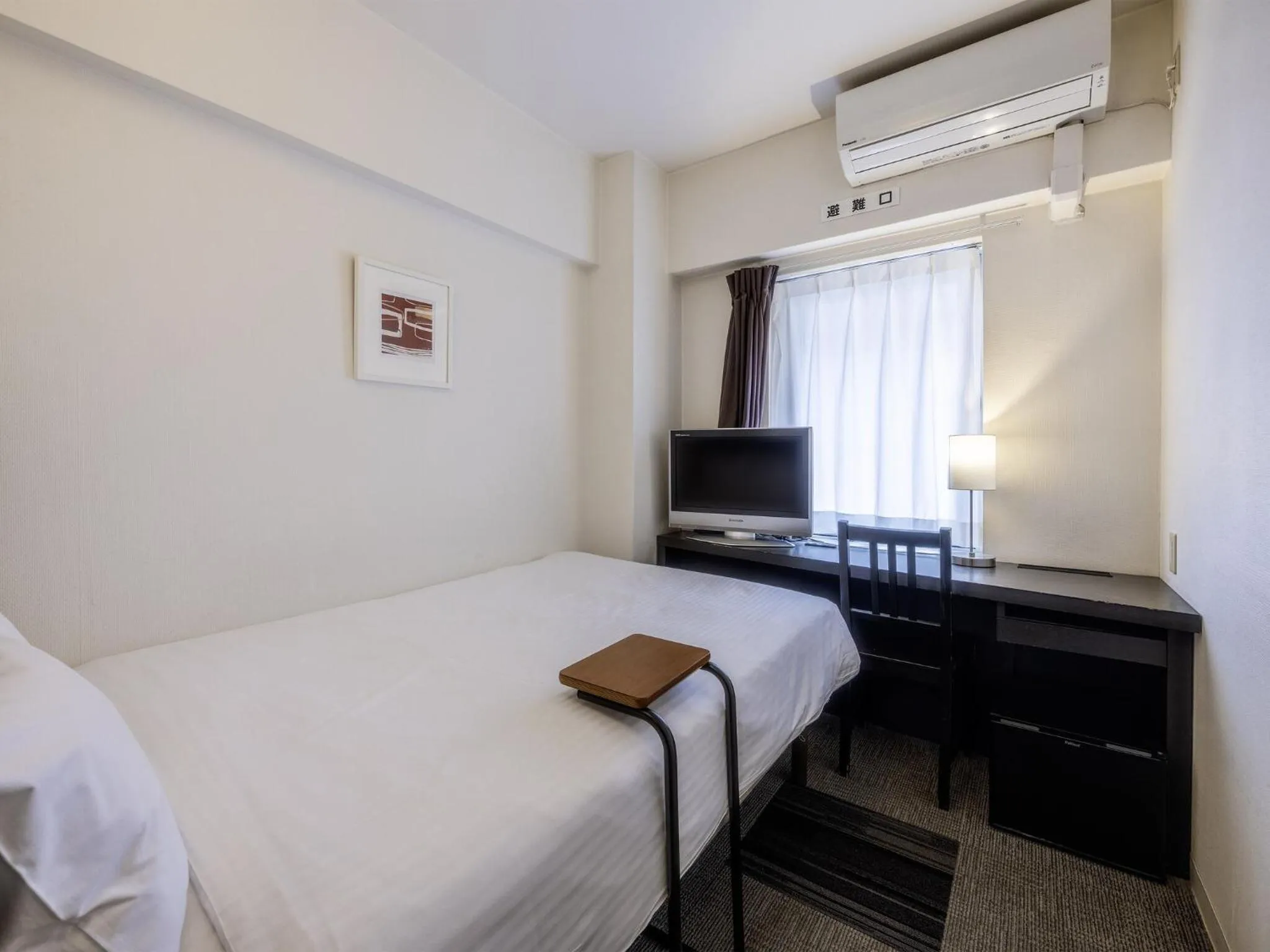 Photo of the whole room, Bed in KOKO HOTEL Yokohama Tsurumi