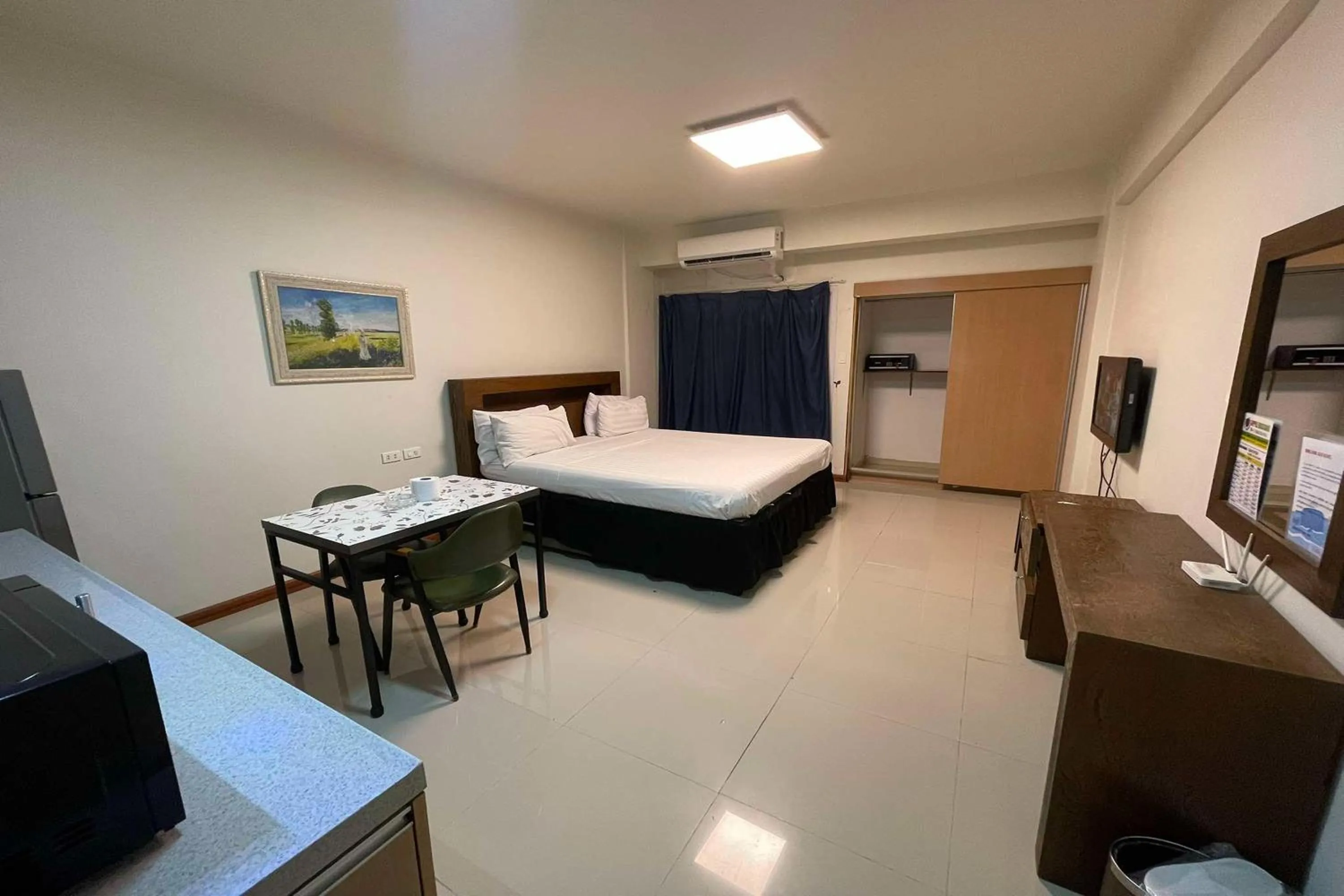 Bed in Aimor Condotel