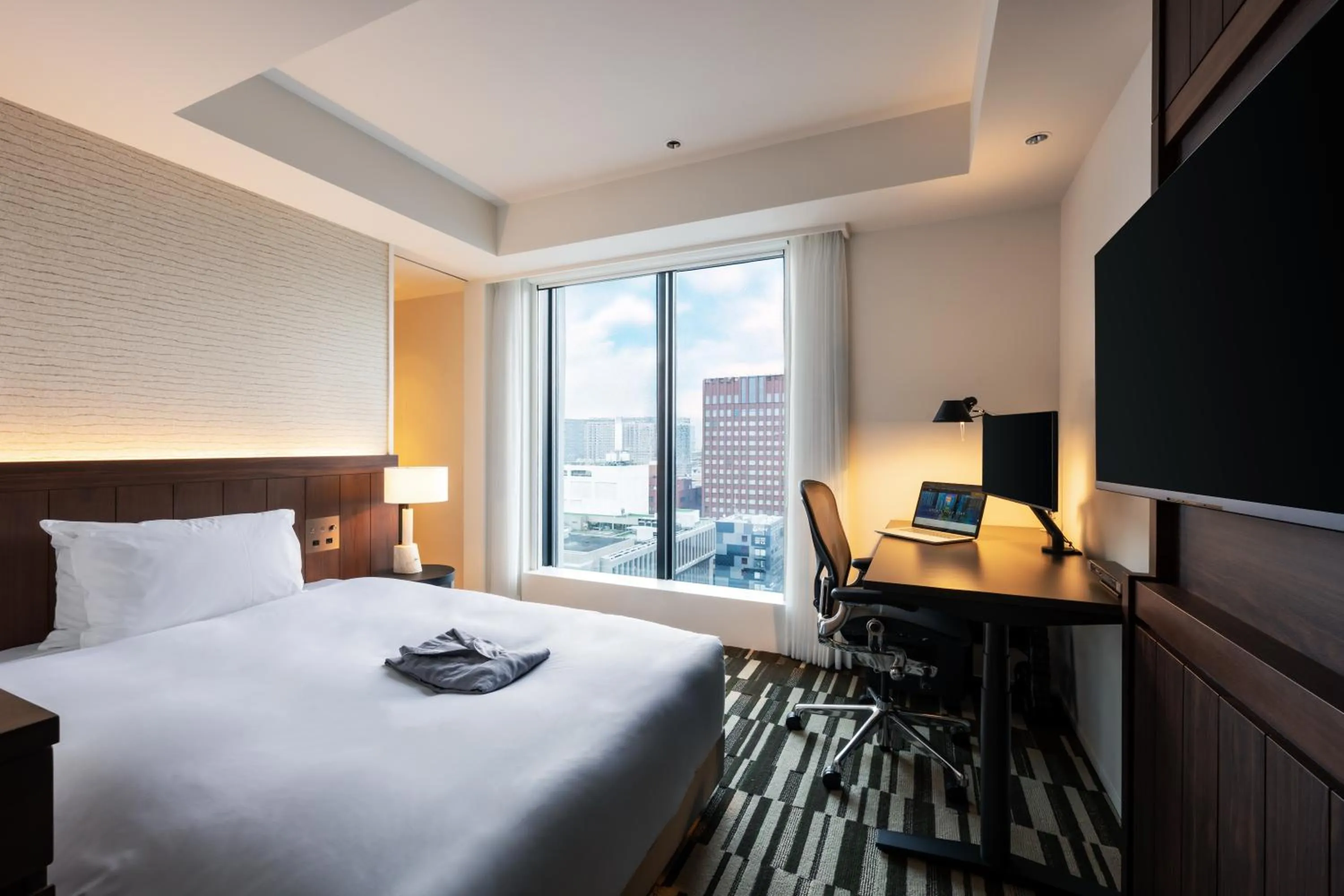 Photo of the whole room, Bed in The Gate Hotel Sapporo by Hulic