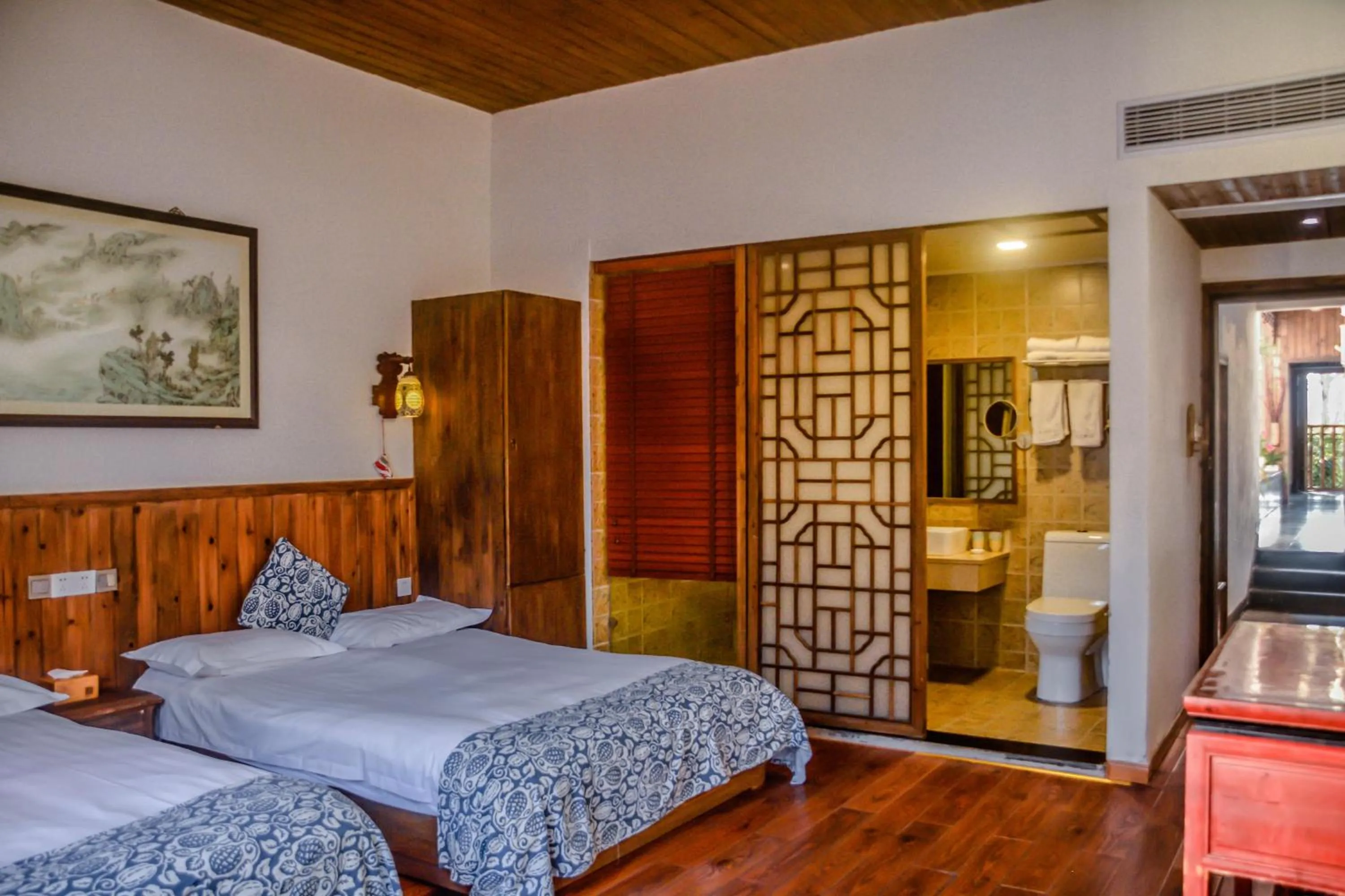 Bed in September Huizhou Inn