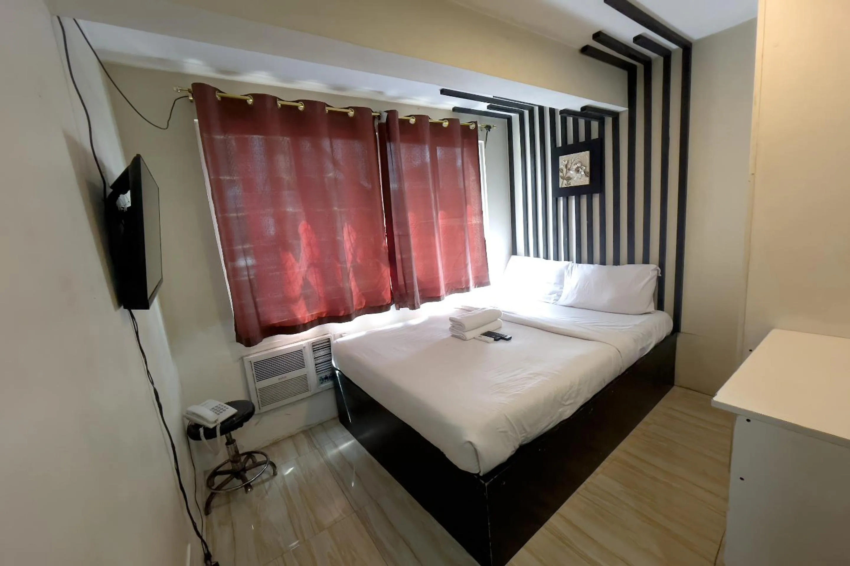 Bed in Jardin Oriental Suites Ubelt Manila