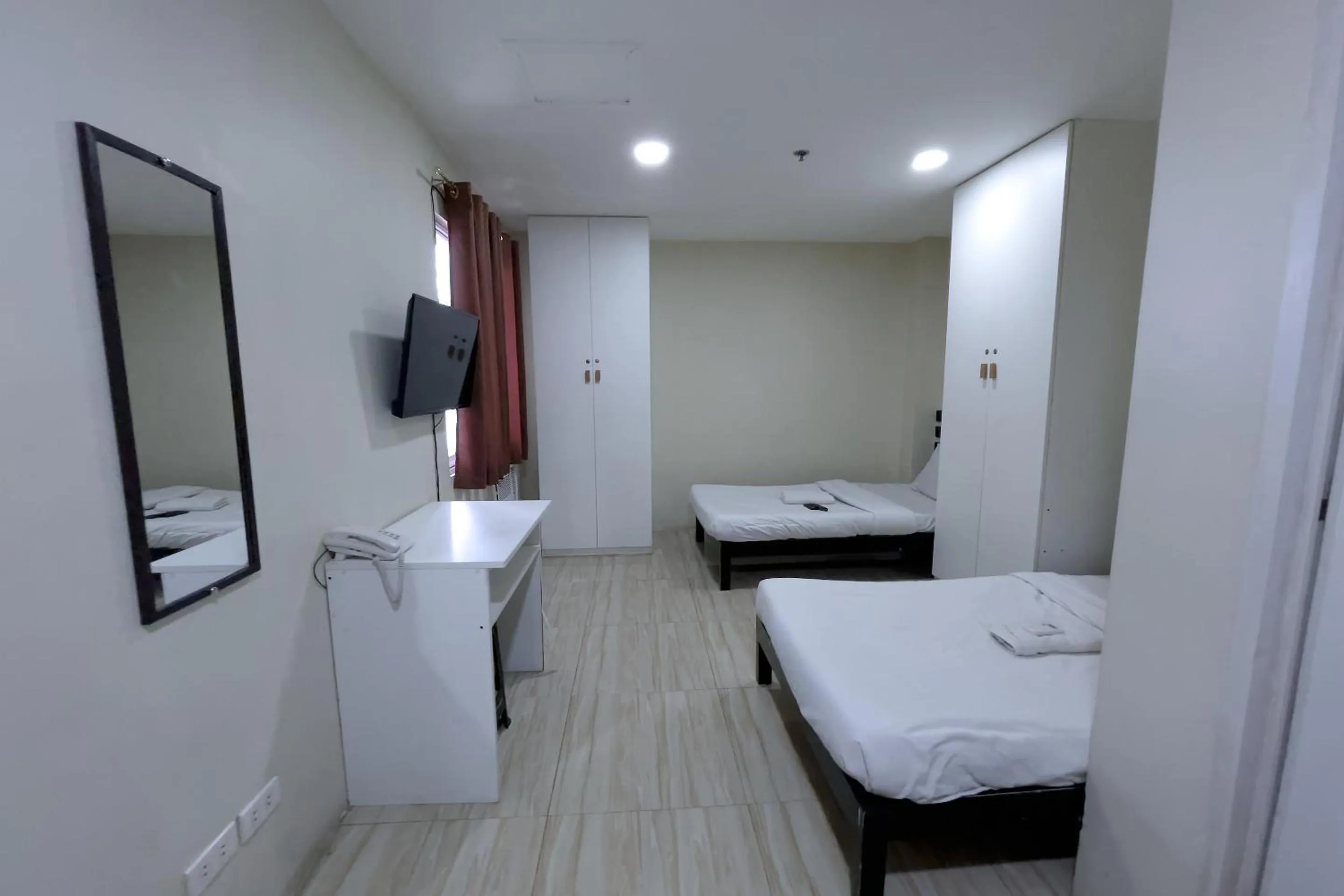 Bed in Jardin Oriental Suites Ubelt Manila