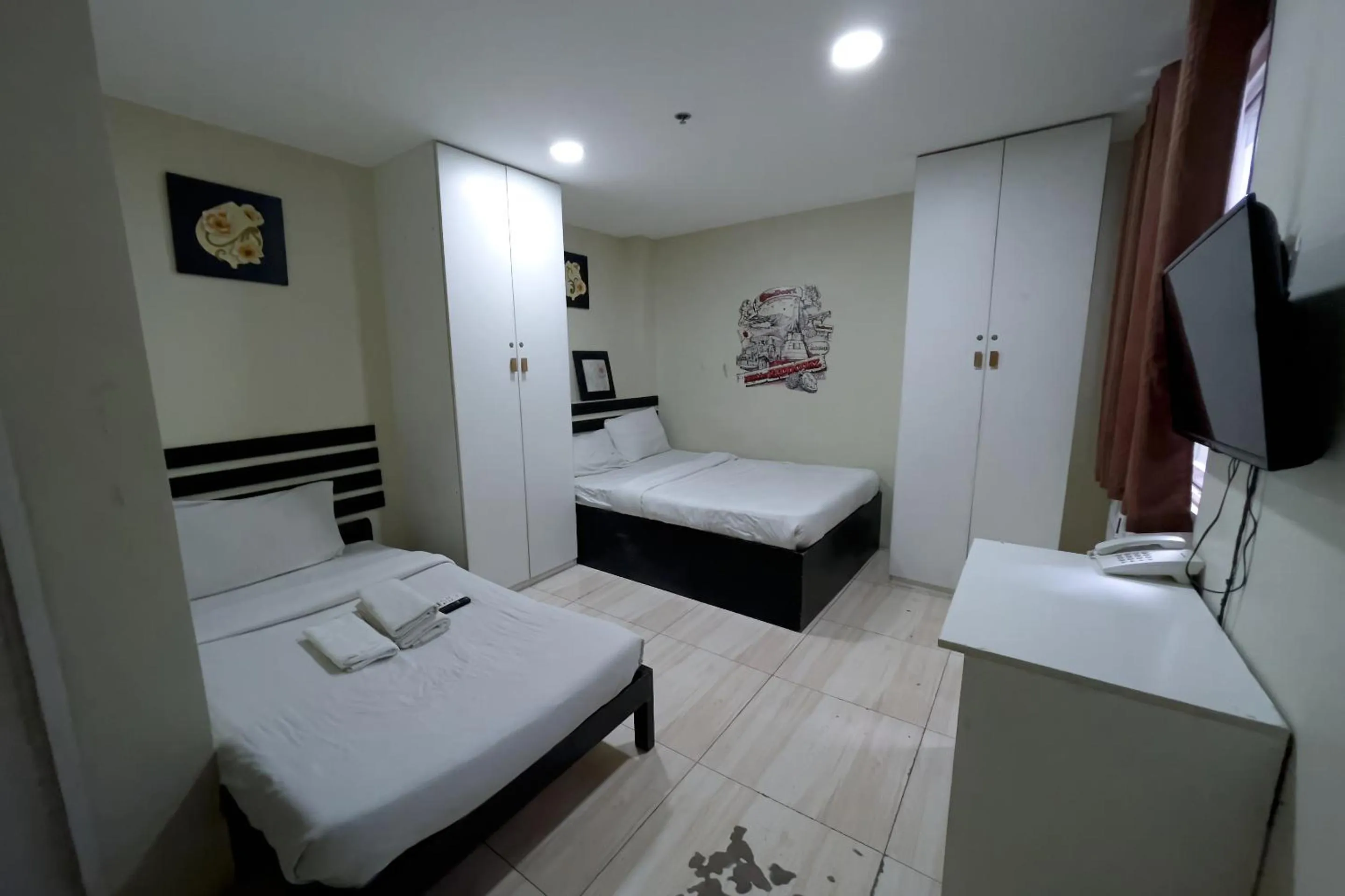 Bed in Jardin Oriental Suites Ubelt Manila