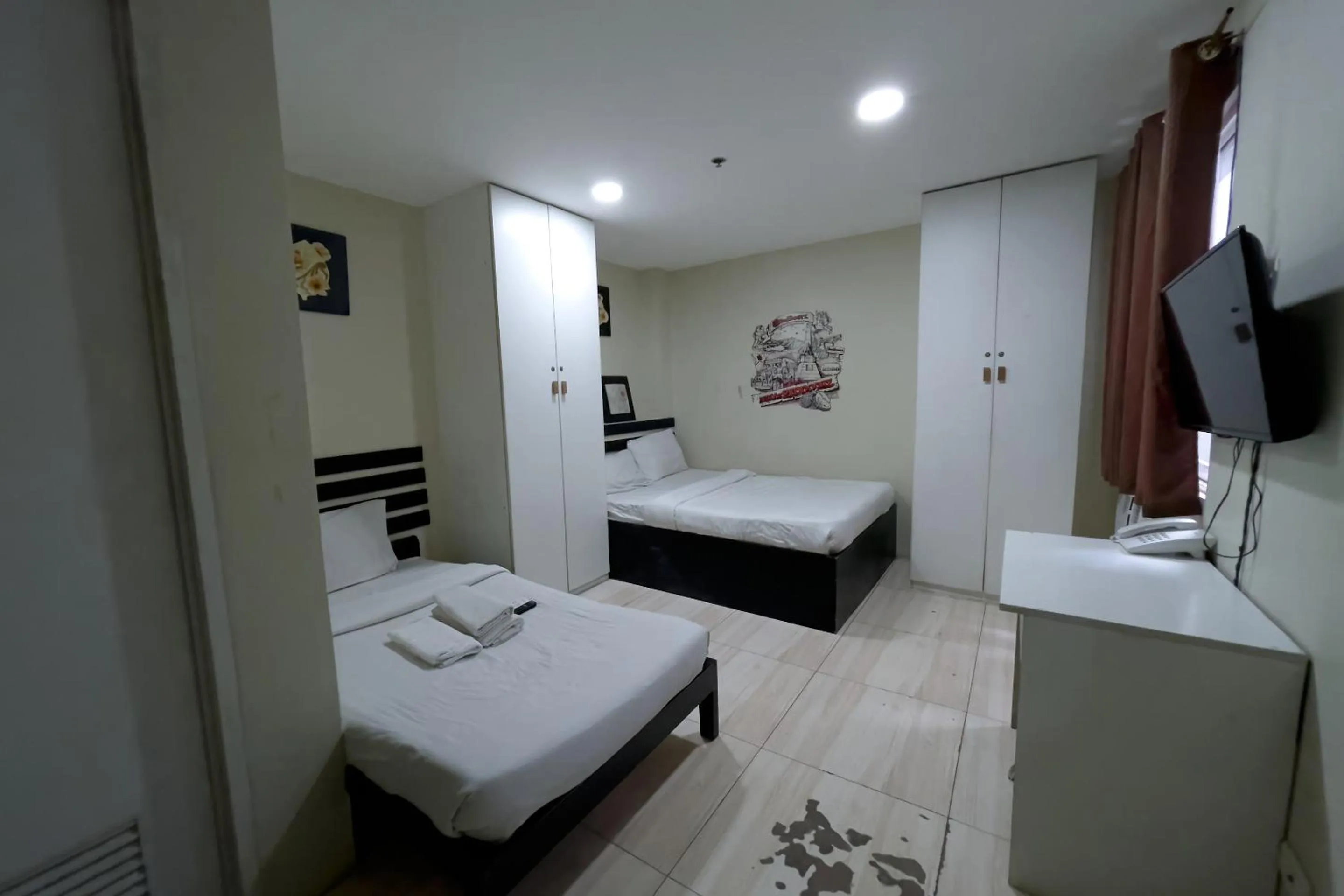 Bed in Jardin Oriental Suites Ubelt Manila