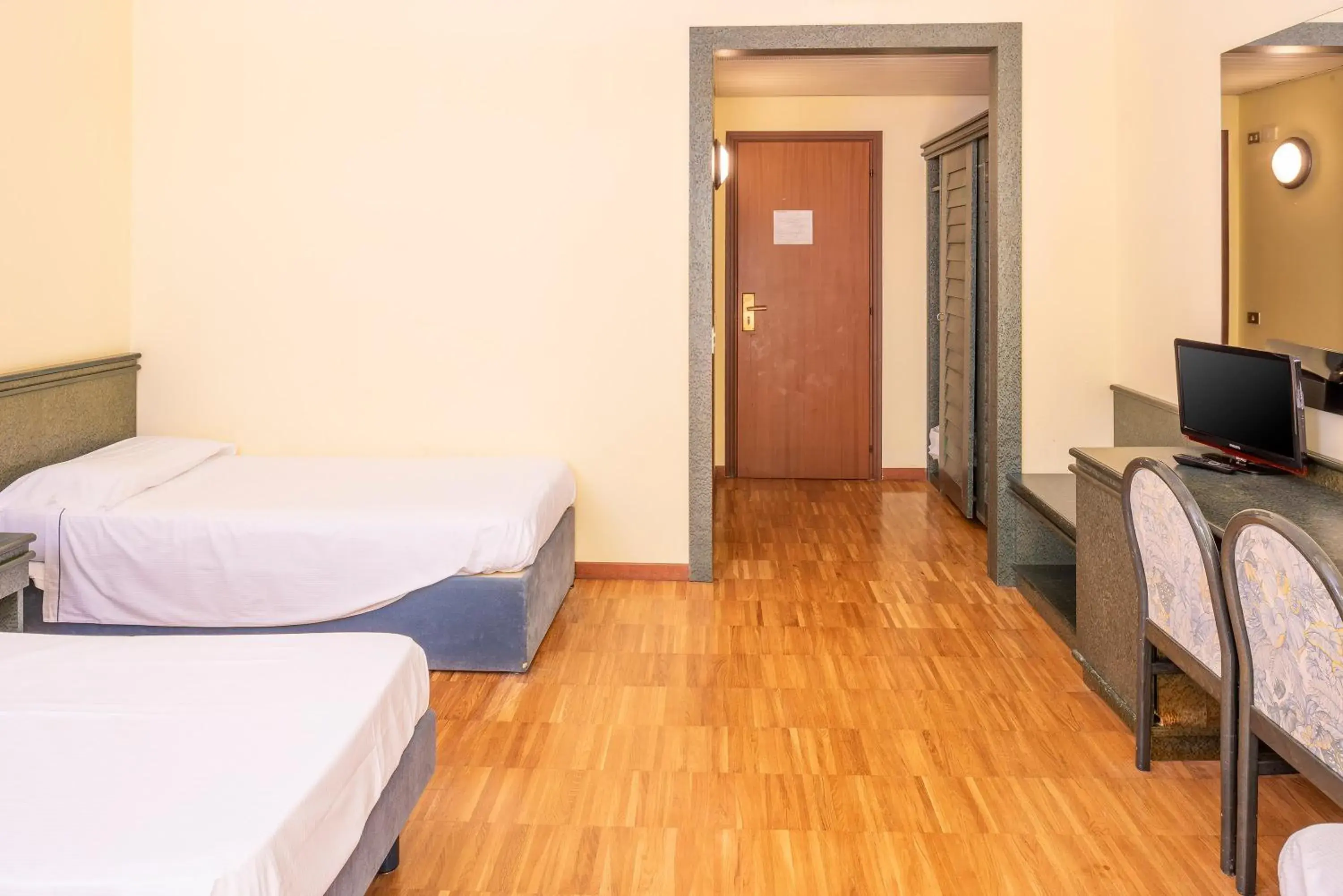 Quadruple Room with Mountain View in Hotel Internazionale Quadruple Room with Mountain View in Hotel Internazionale