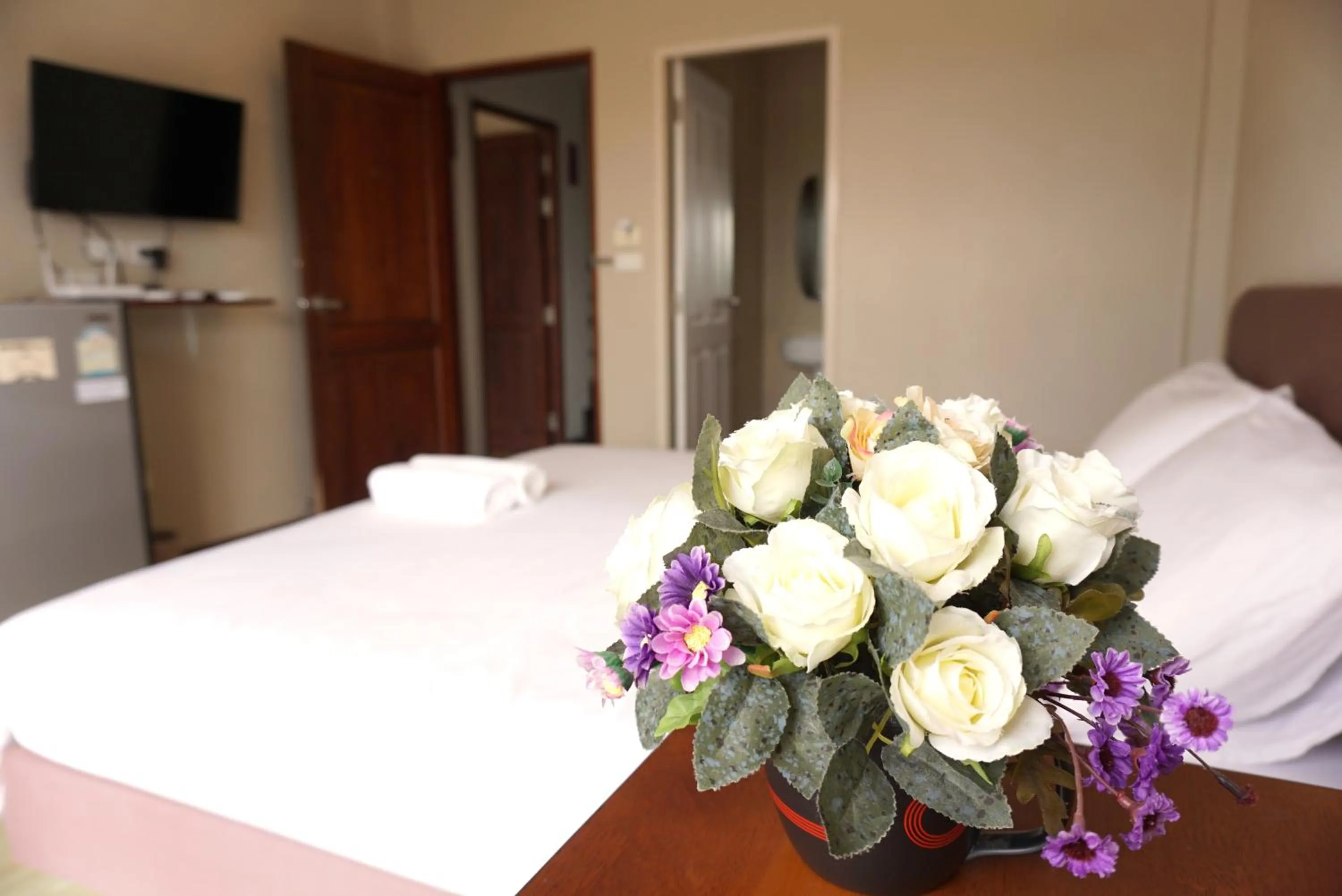 Bed in Chompu Nakarin Apartment