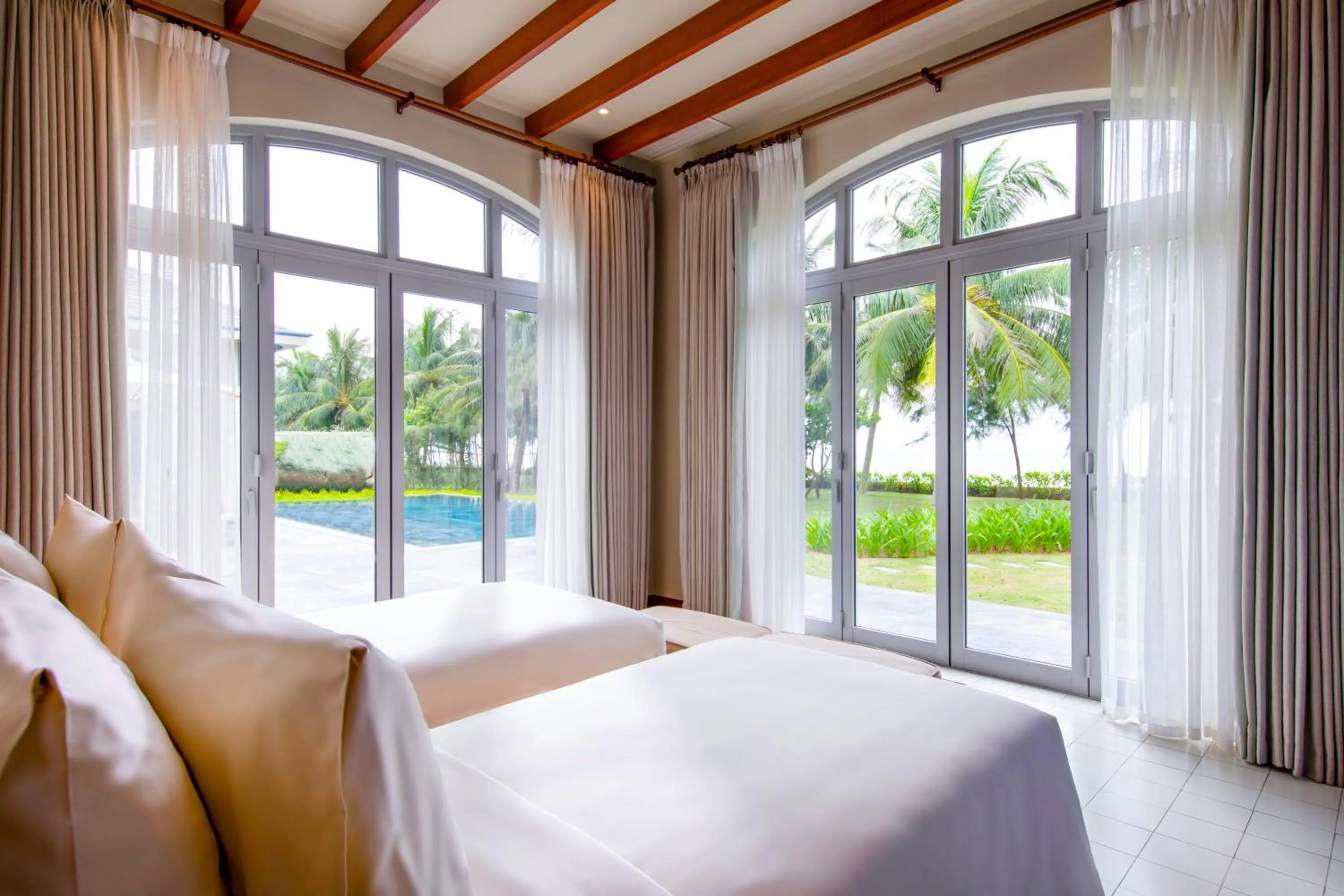 Bed in FLC Luxury Resort Samson