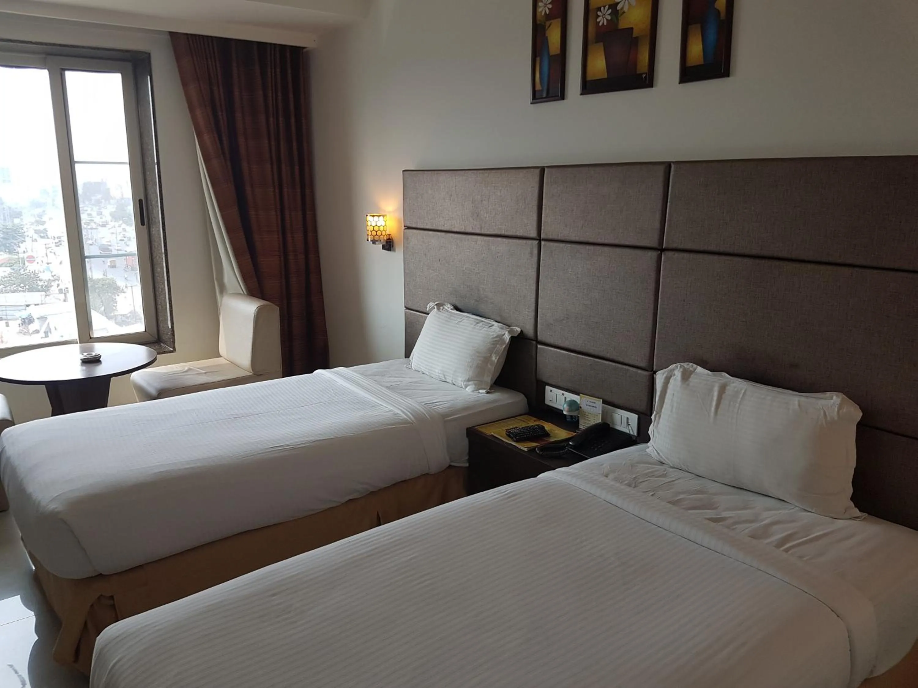 Bed in Hotel Sitara Grand Miyapur