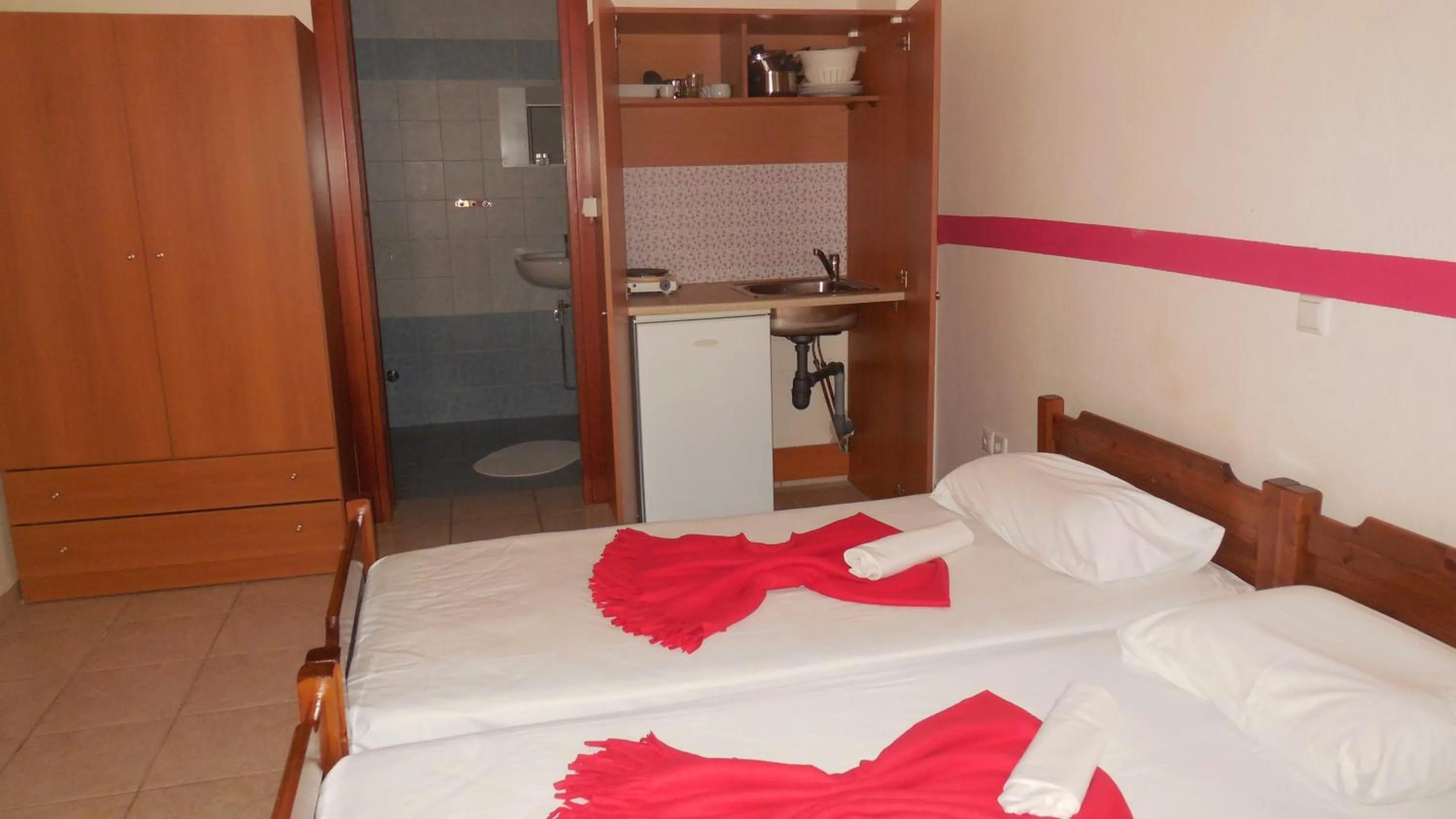 Kitchen or kitchenette, Bed in Star Beach Resort