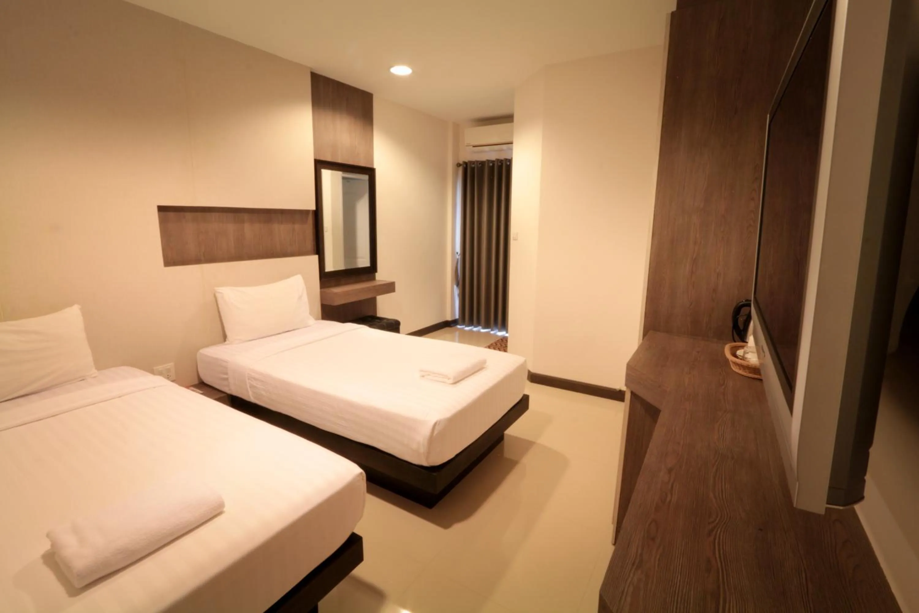 Toilet, Bed in Fortune Surin Hotel