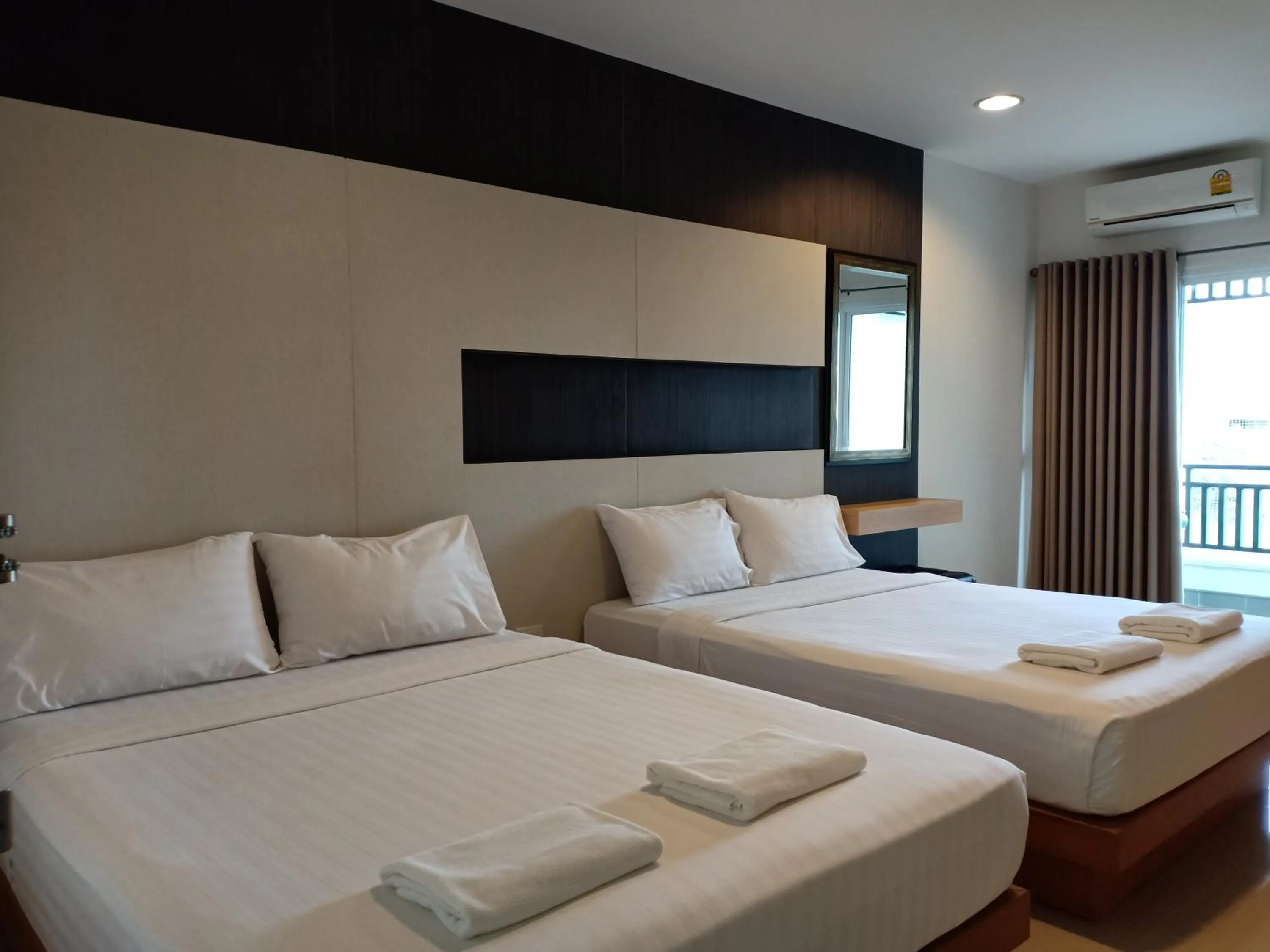 Staff, Bed in Fortune Surin Hotel