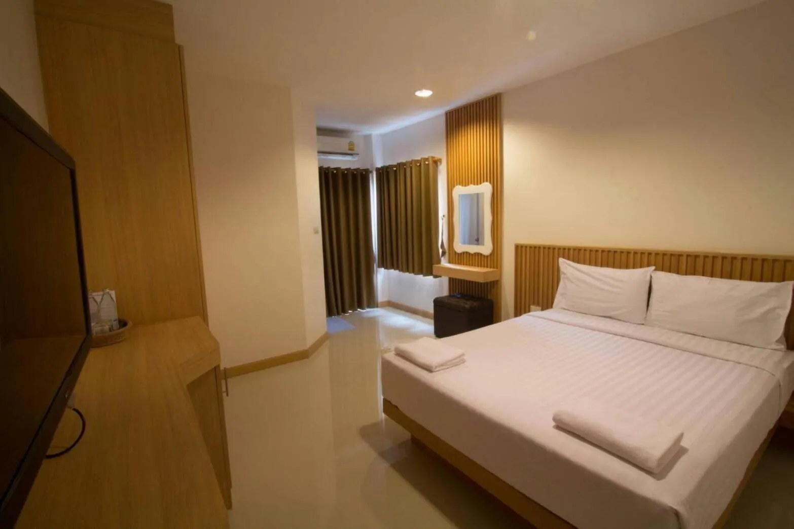 Photo of the whole room, Bed in Fortune Surin Hotel