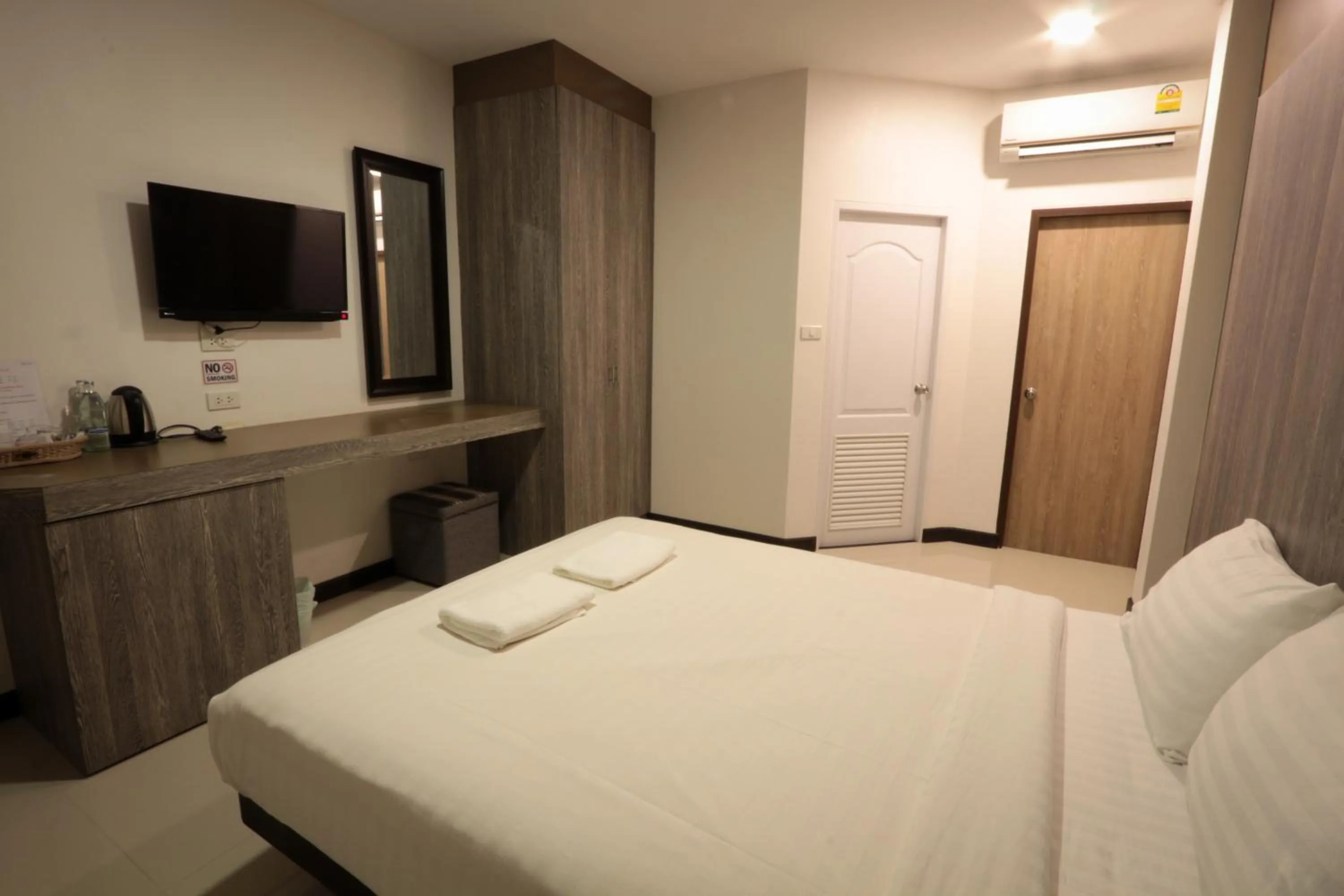 Bed in Fortune Surin Hotel