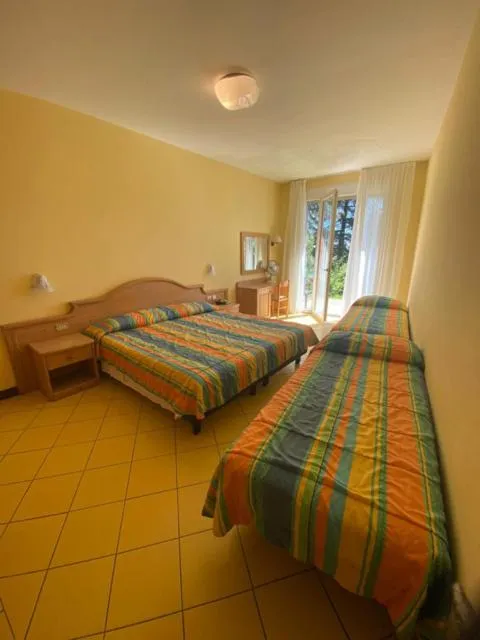 Bed in Hotel Marco Polo