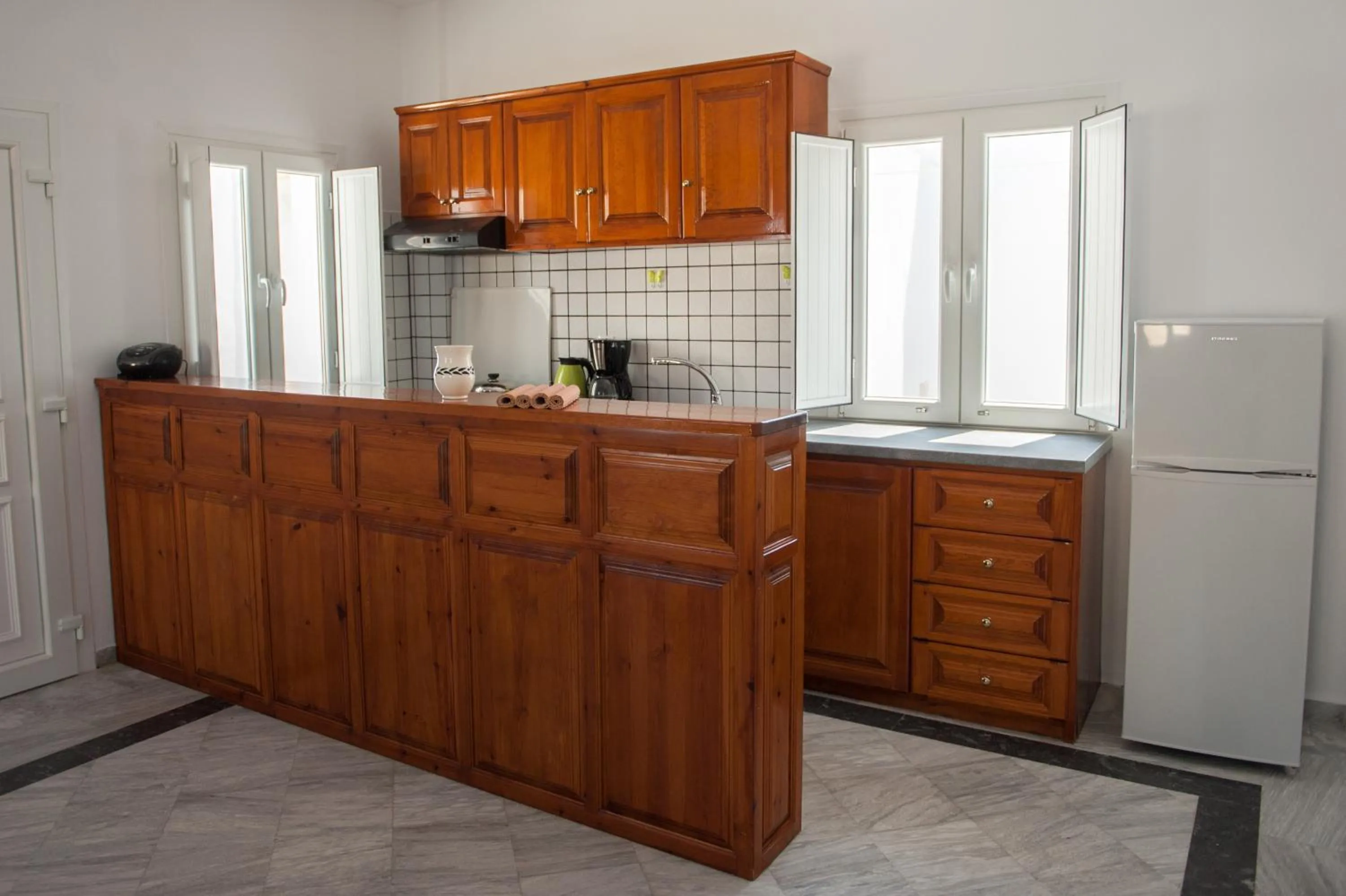 Kitchen or kitchenette in Altea Apartments