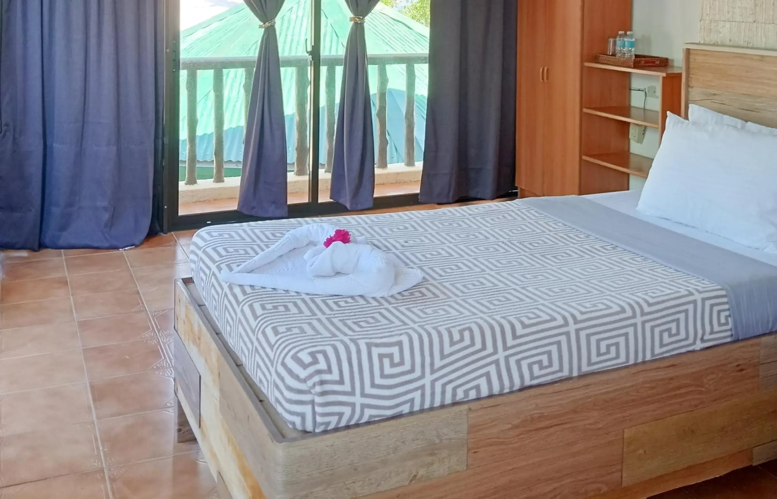 Deluxe Room in Nalusuan Island Resort and Marine Sanctuary Deluxe Room in Nalusuan Island Resort and Marine Sanctuary