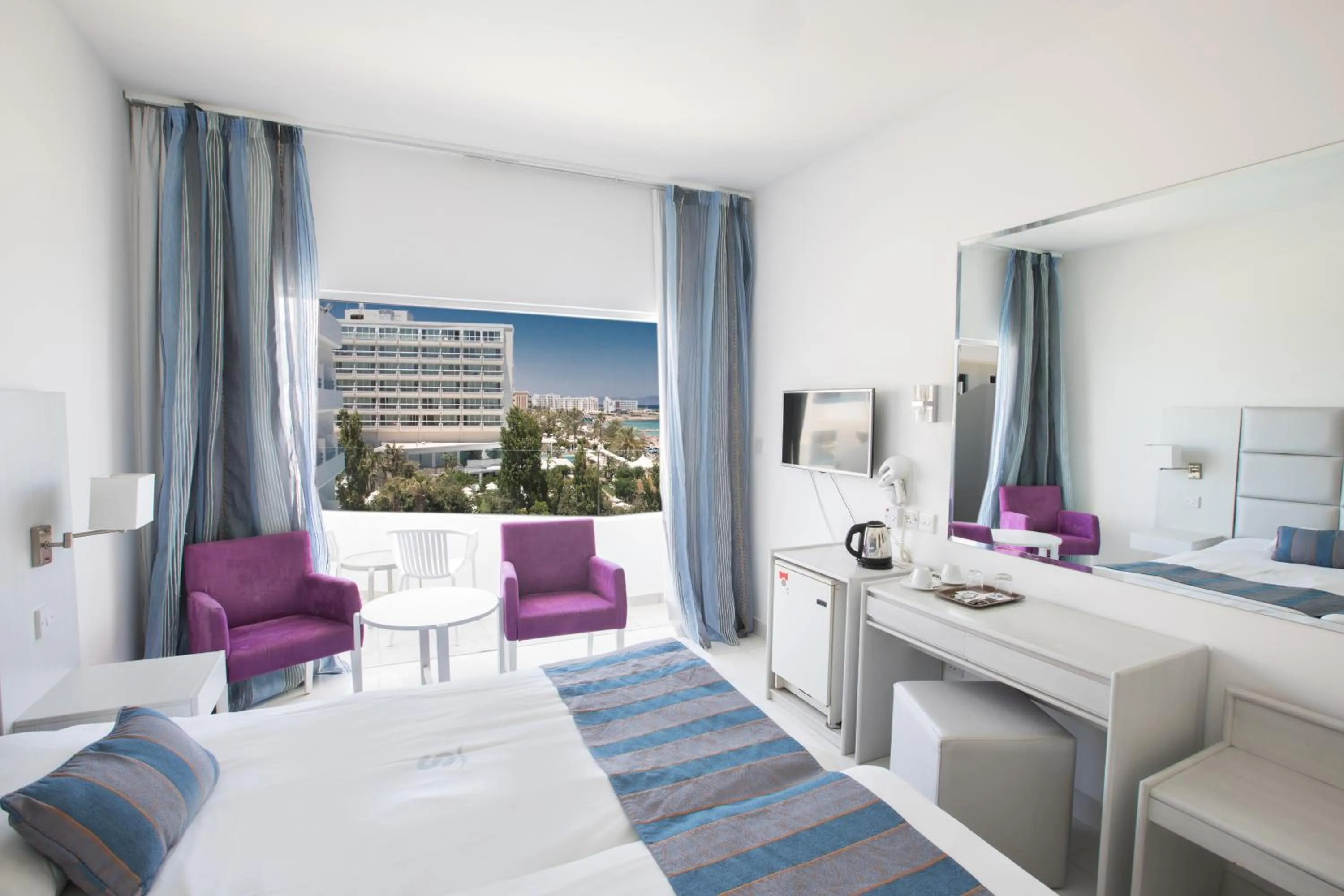 Bed in Silver Sands Beach Hotel