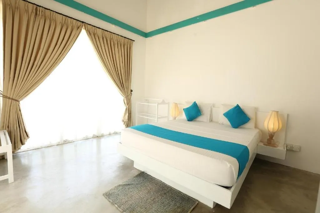 Bed in The Beach house by Kay Jay Hotels