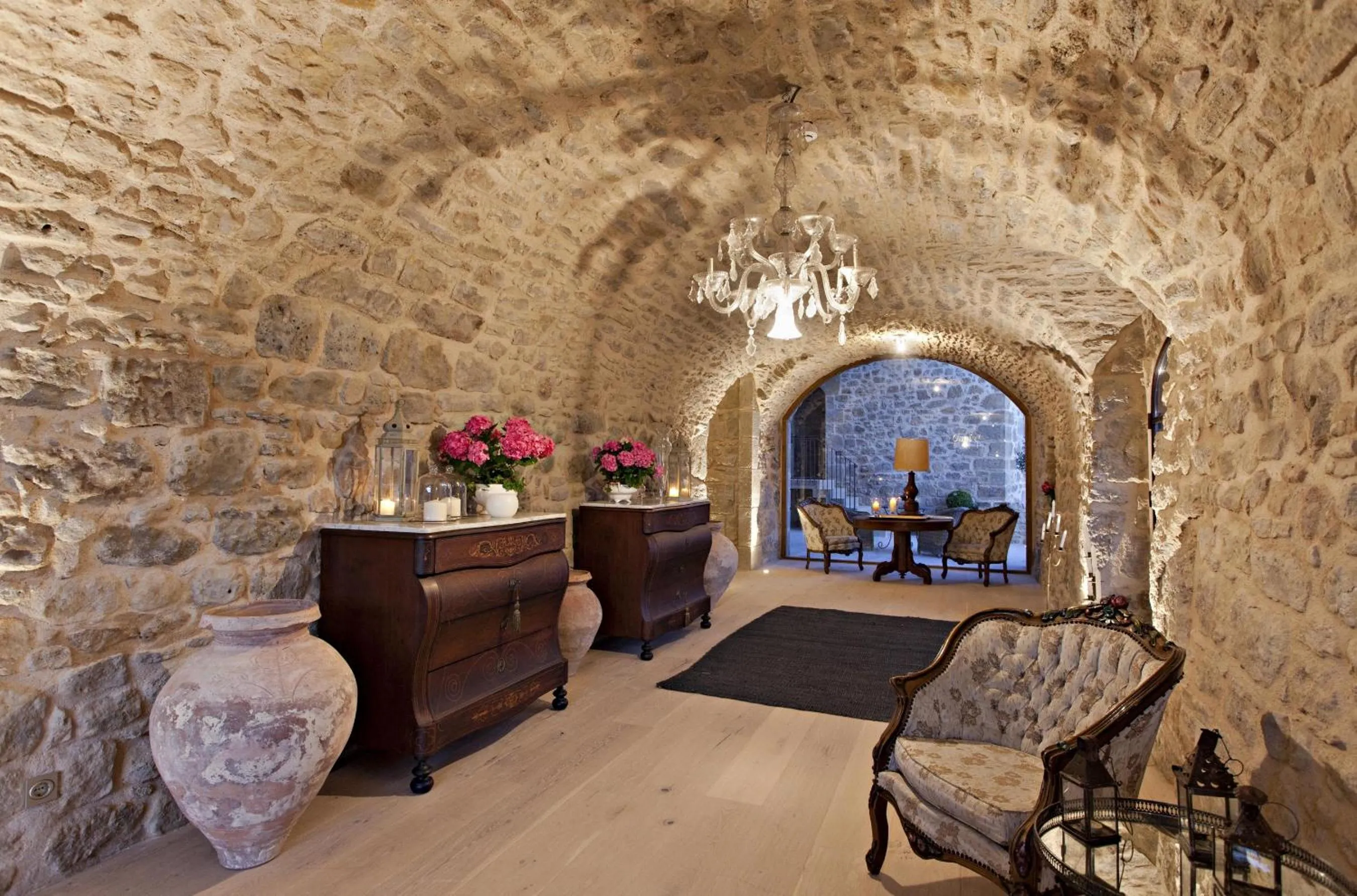 Communal lounge/ TV room in La Vella Farga Hotel