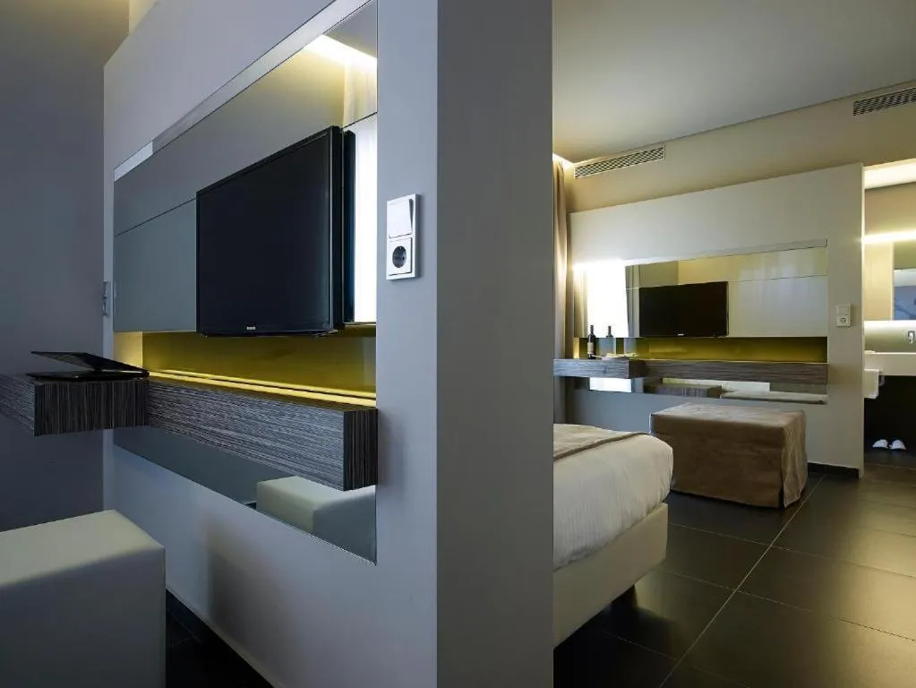 Photo of the whole room, Bed in NEMA Design Hotel & Spa - Adults Only
