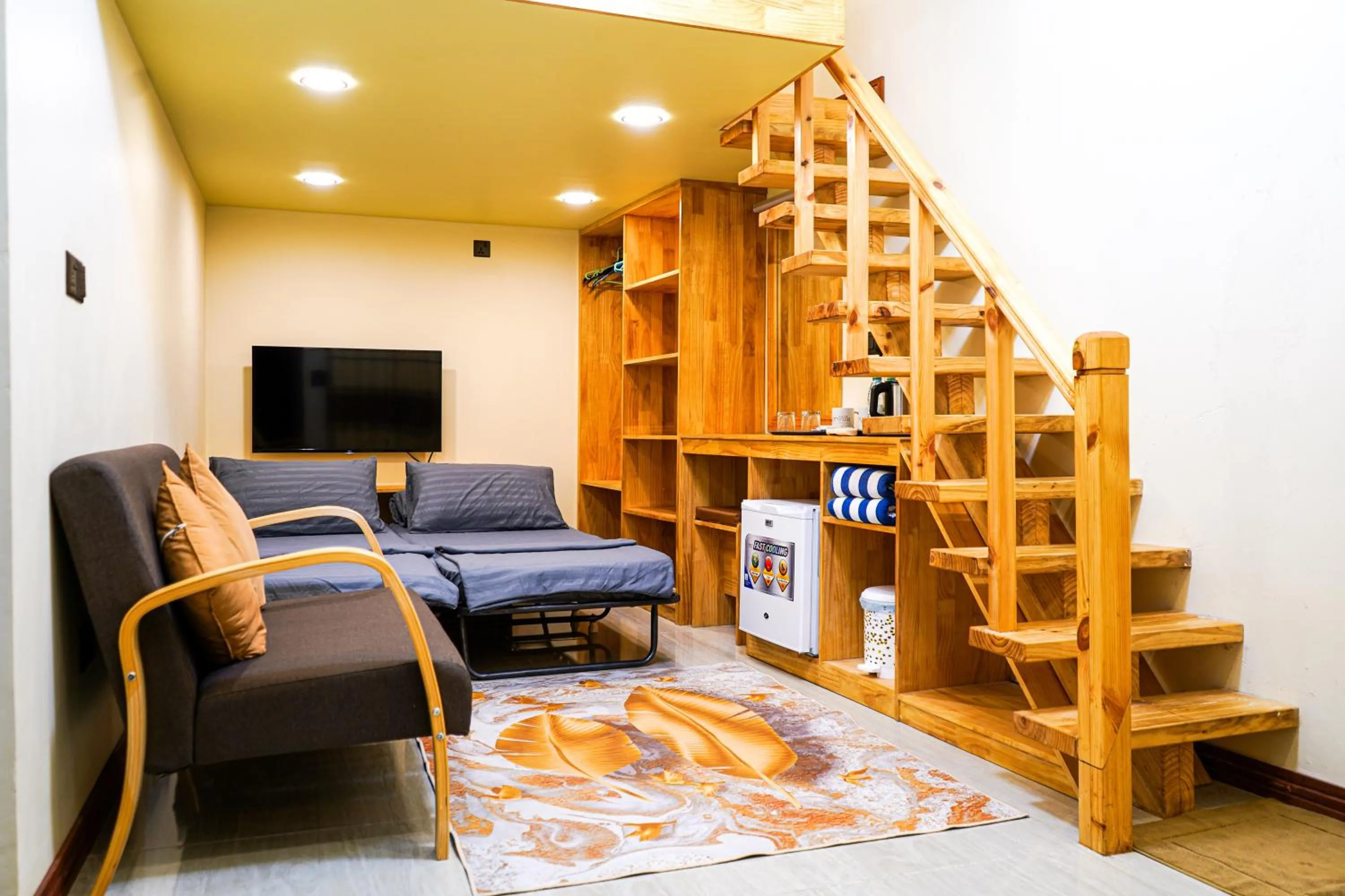 Communal lounge/ TV room in Banyan Villa Maldives Dhangethi