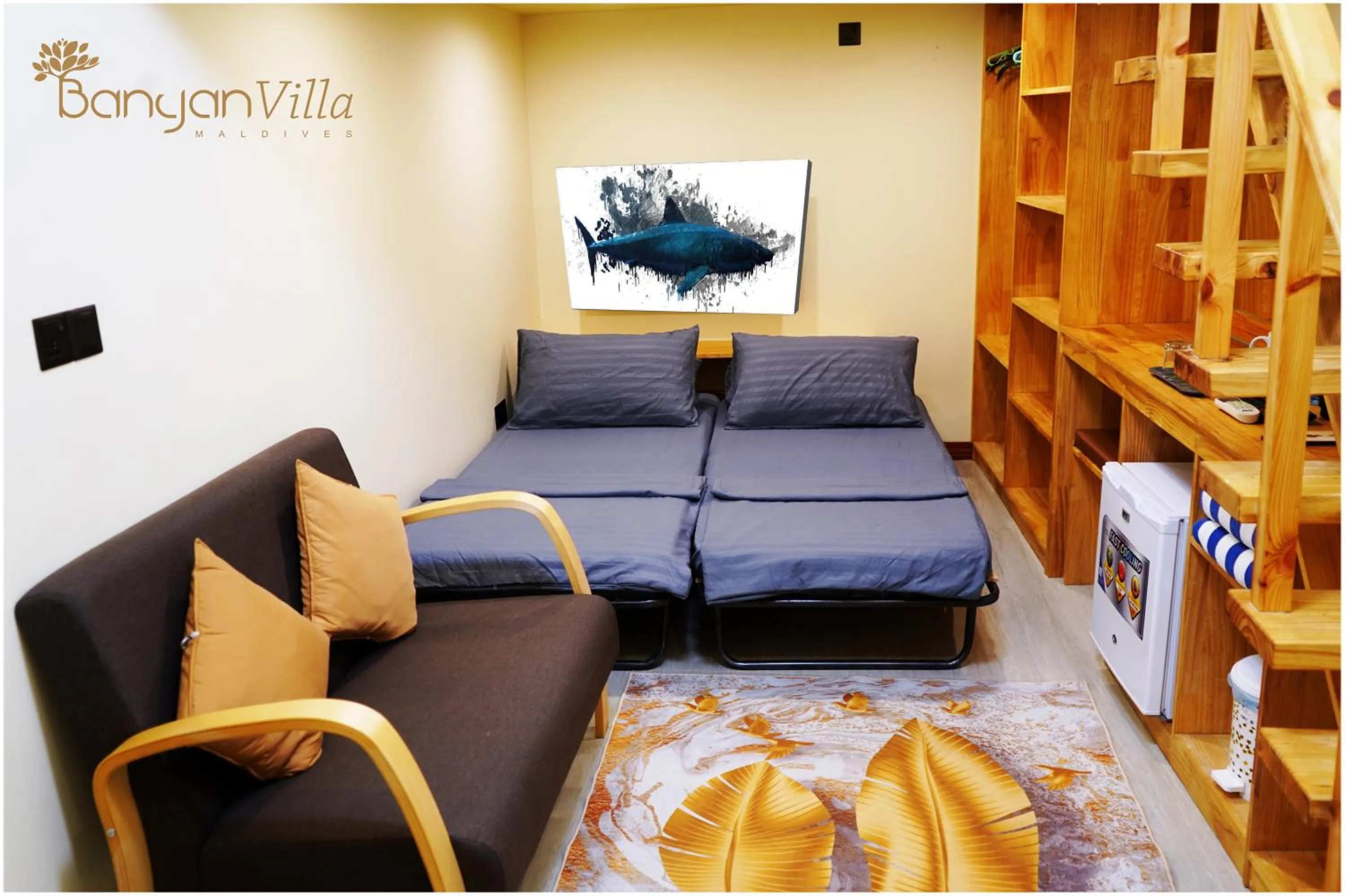 Communal lounge/ TV room in Banyan Villa Maldives Dhangethi