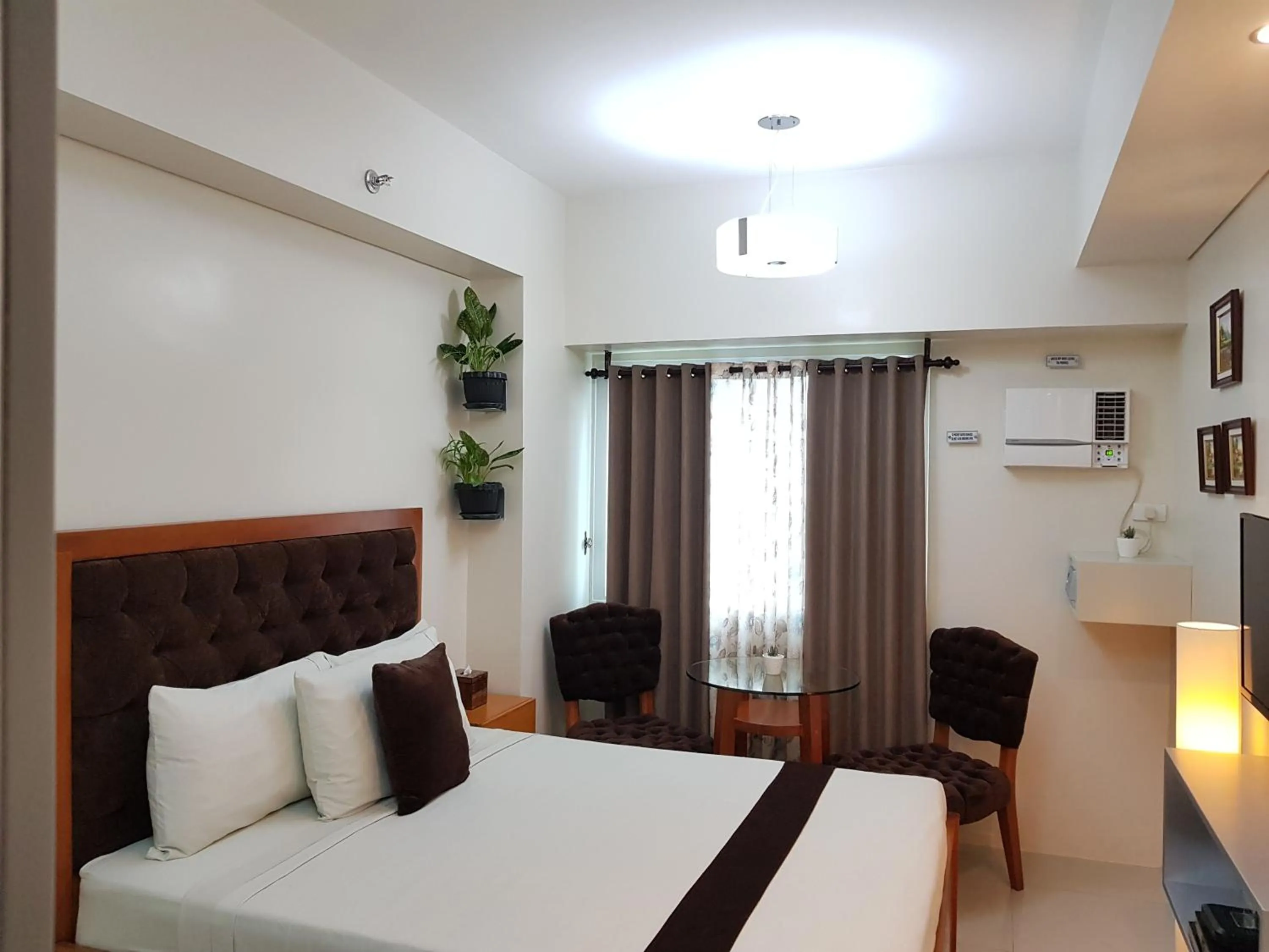 Bed in Studio Unit at The Beacon Makati