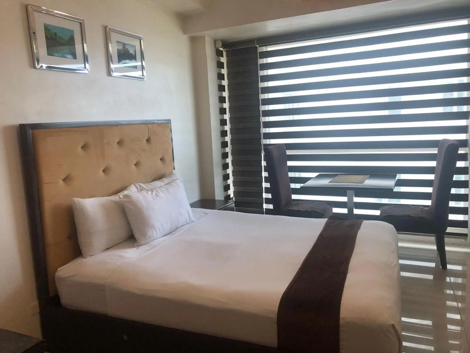 Bed in Studio Unit at The Beacon Makati