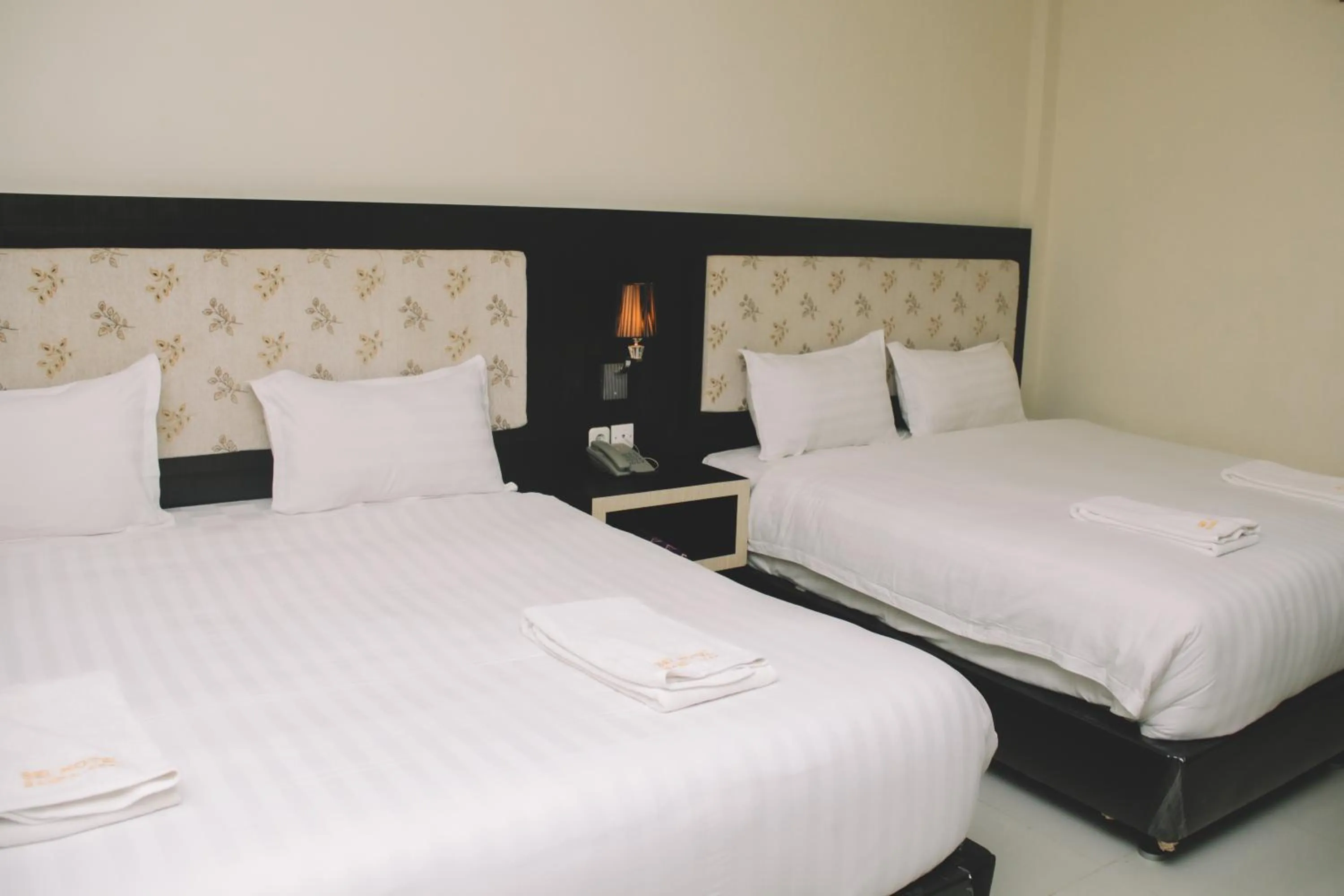 Bed in Sei Hotel Aceh