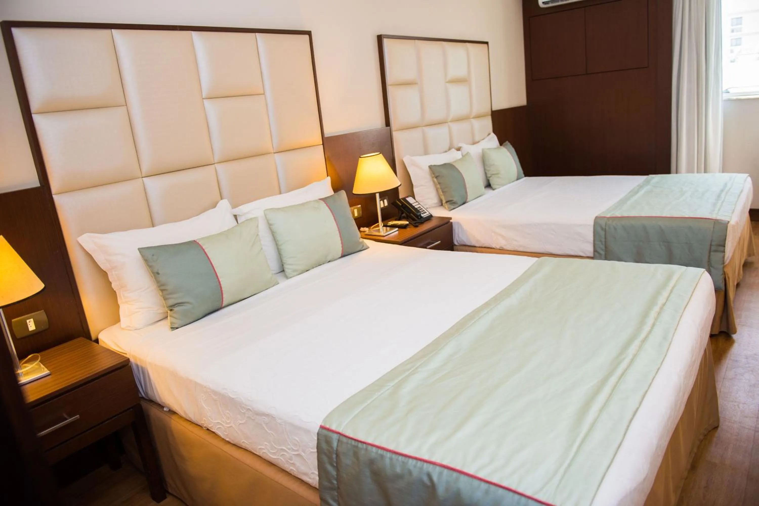 Bed in Royal Atlântica Macaé Hotel