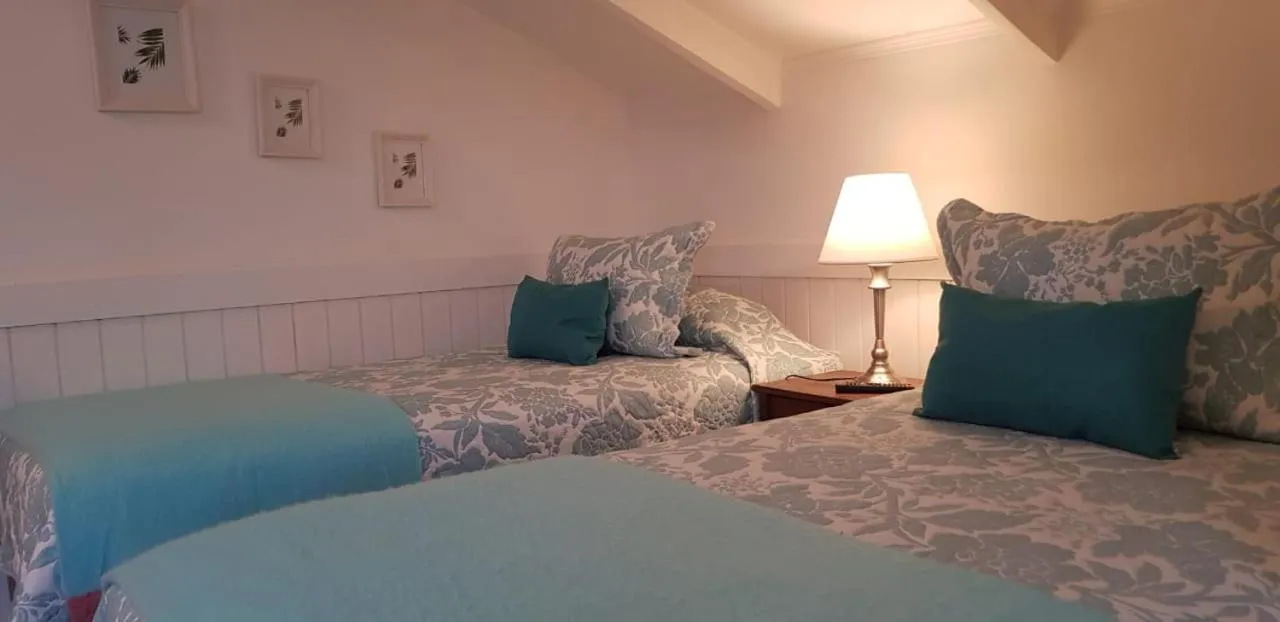 Bed in Hotel Puerta del Lago