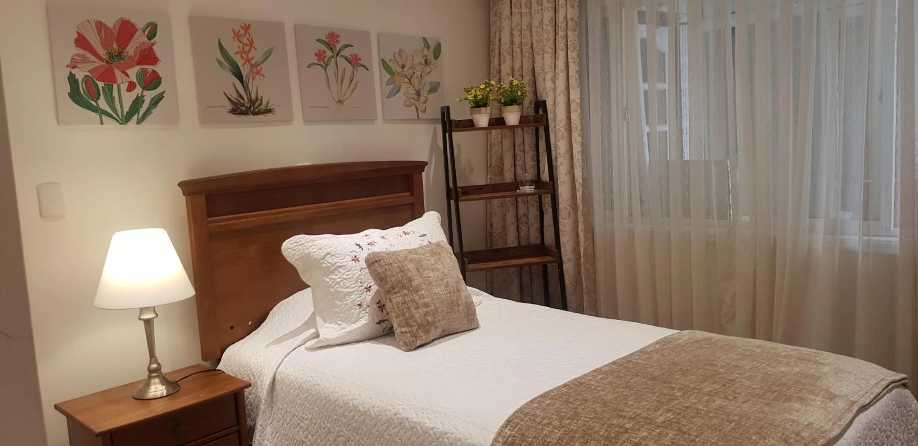 Bed in Hotel Puerta del Lago