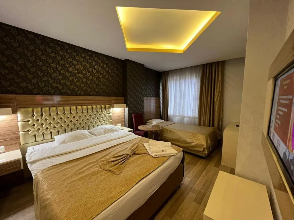 Bed in Grand Ezel Hotel